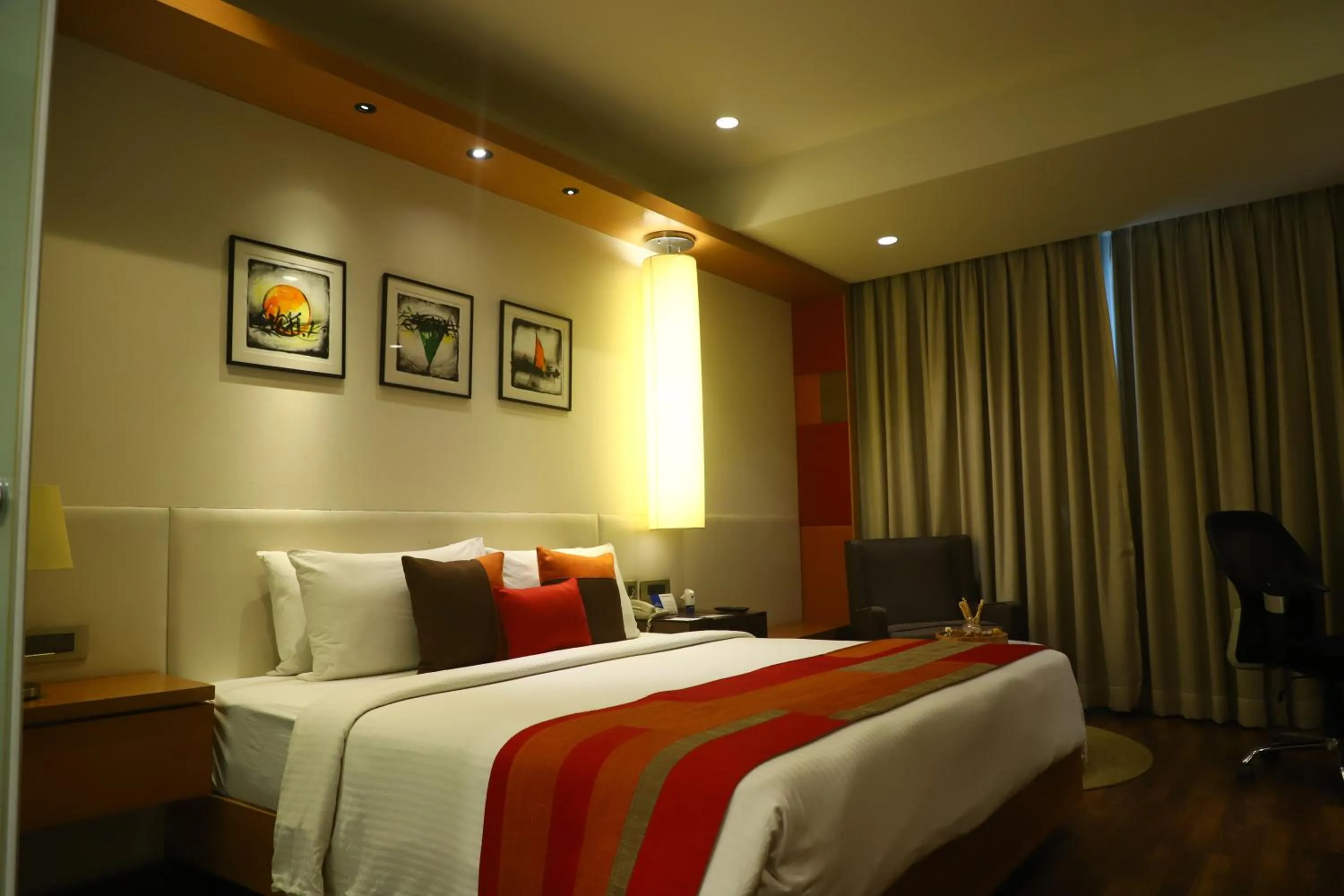 Bed in Deventure Sarovar Portico Kapashera, New Delhi