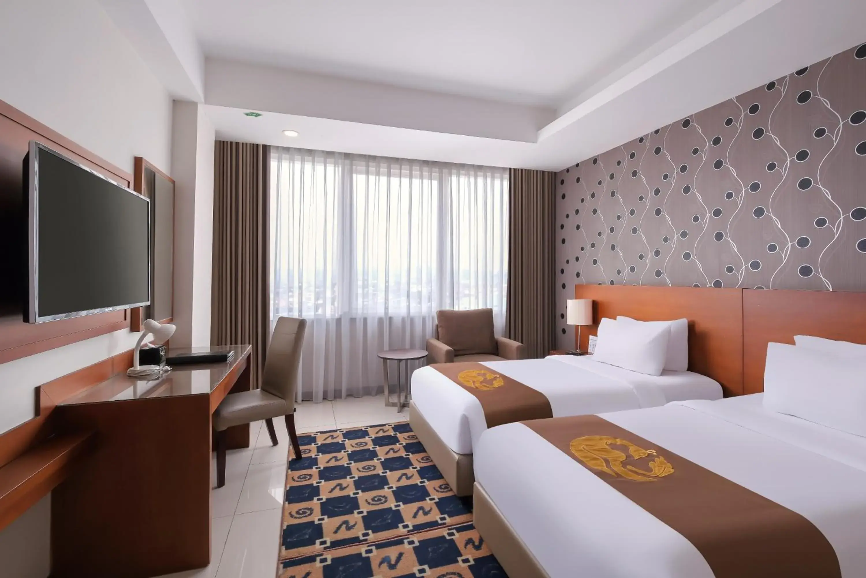 Grand Deluxe Double or Twin Room in Gets Premiere Semarang Grand Deluxe Double or Twin Room in Gets Premiere Semarang