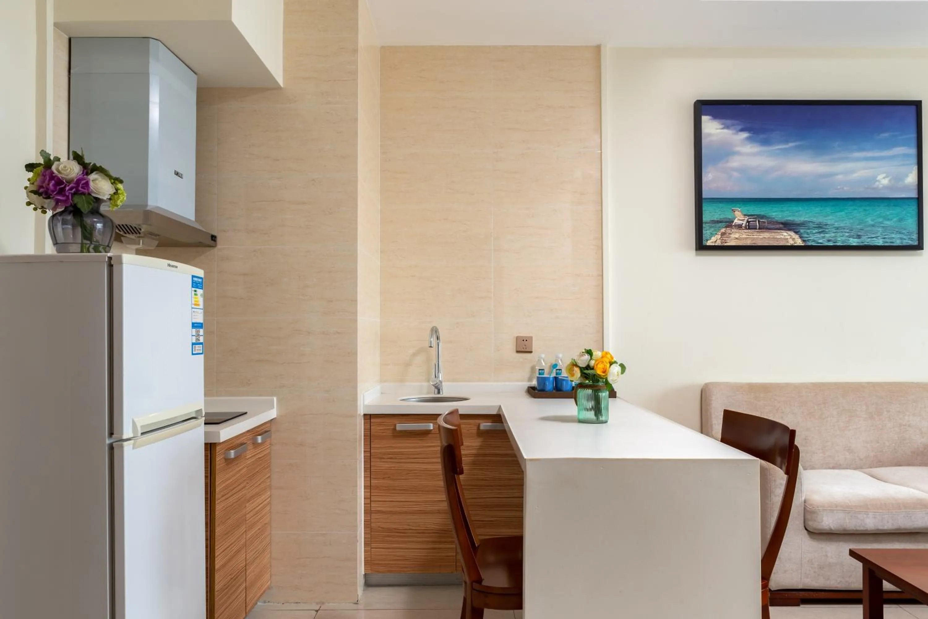Kitchen or kitchenette in Paxton Vacances Hotel & Suite Sanya