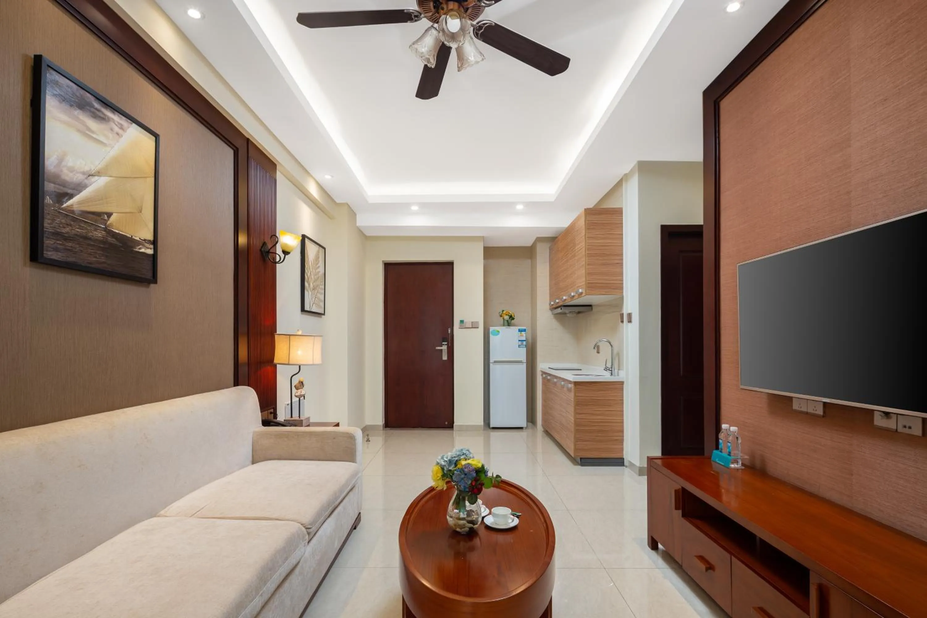 Photo of the whole room, TV/Entertainment Center in Paxton Vacances Hotel & Suite Sanya