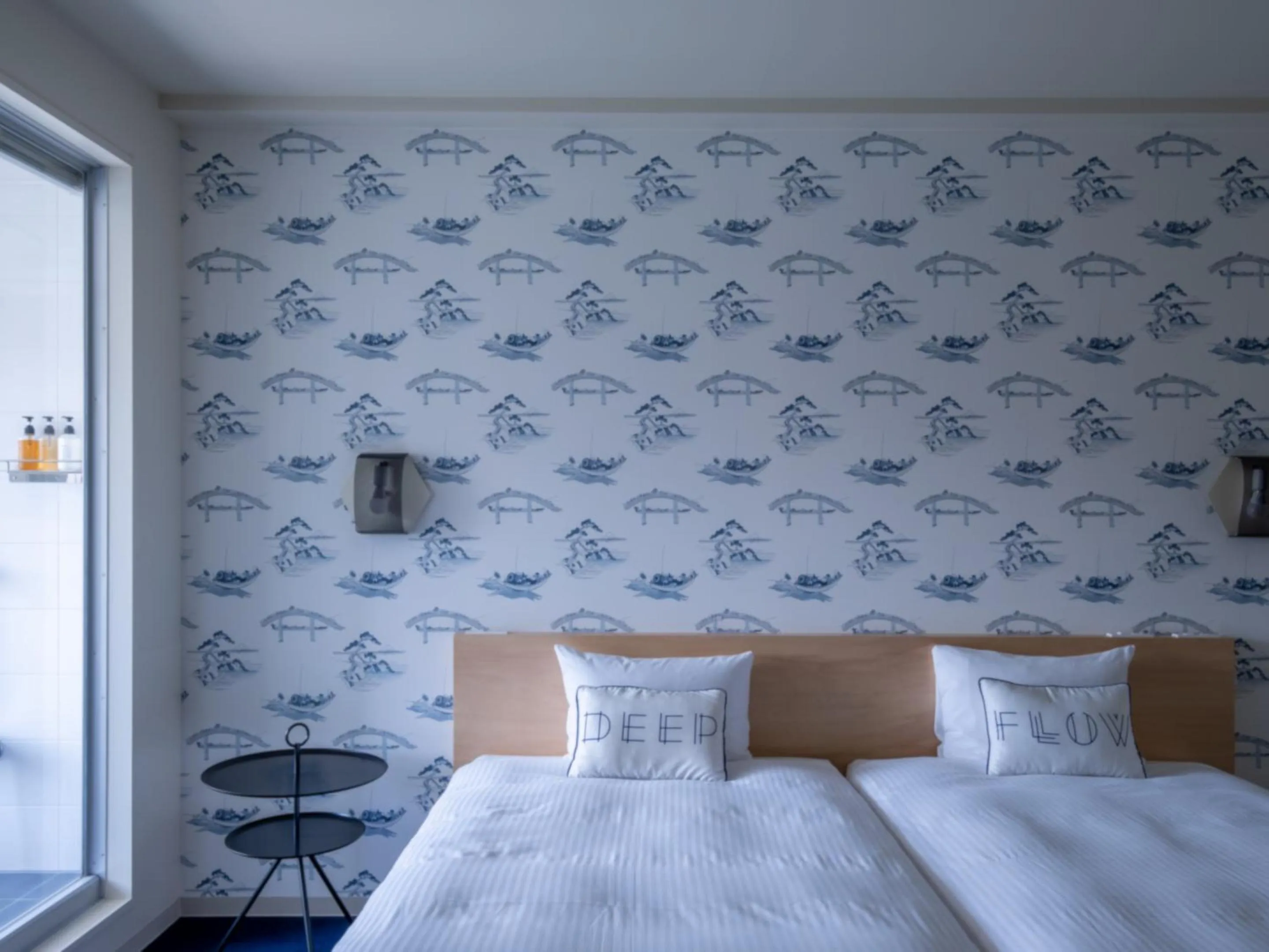 Bed in LYURO Tokyo Kiyosumi by THE SHARE HOTELS