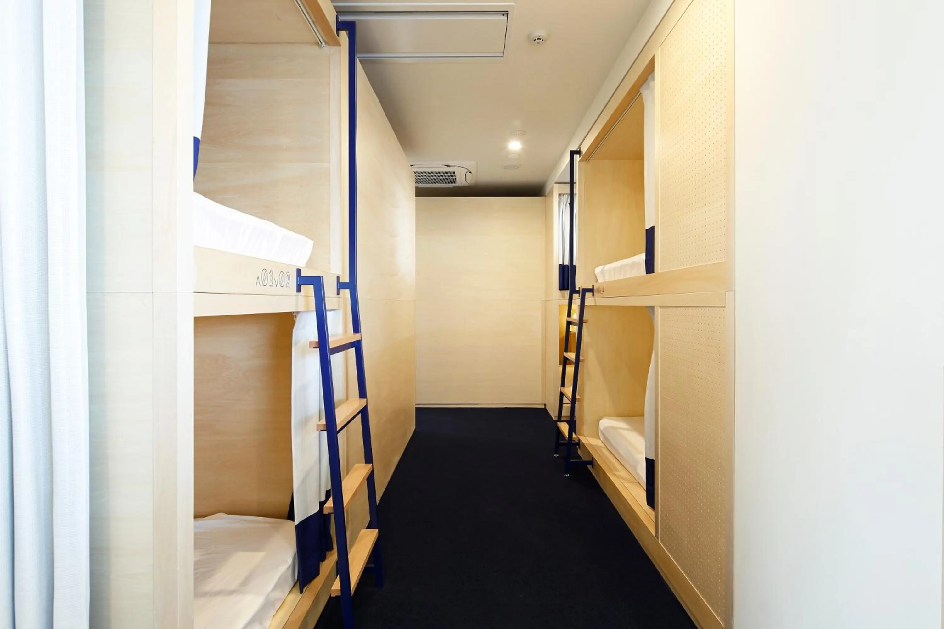 bunk bed, Bed in LYURO Tokyo Kiyosumi by THE SHARE HOTELS