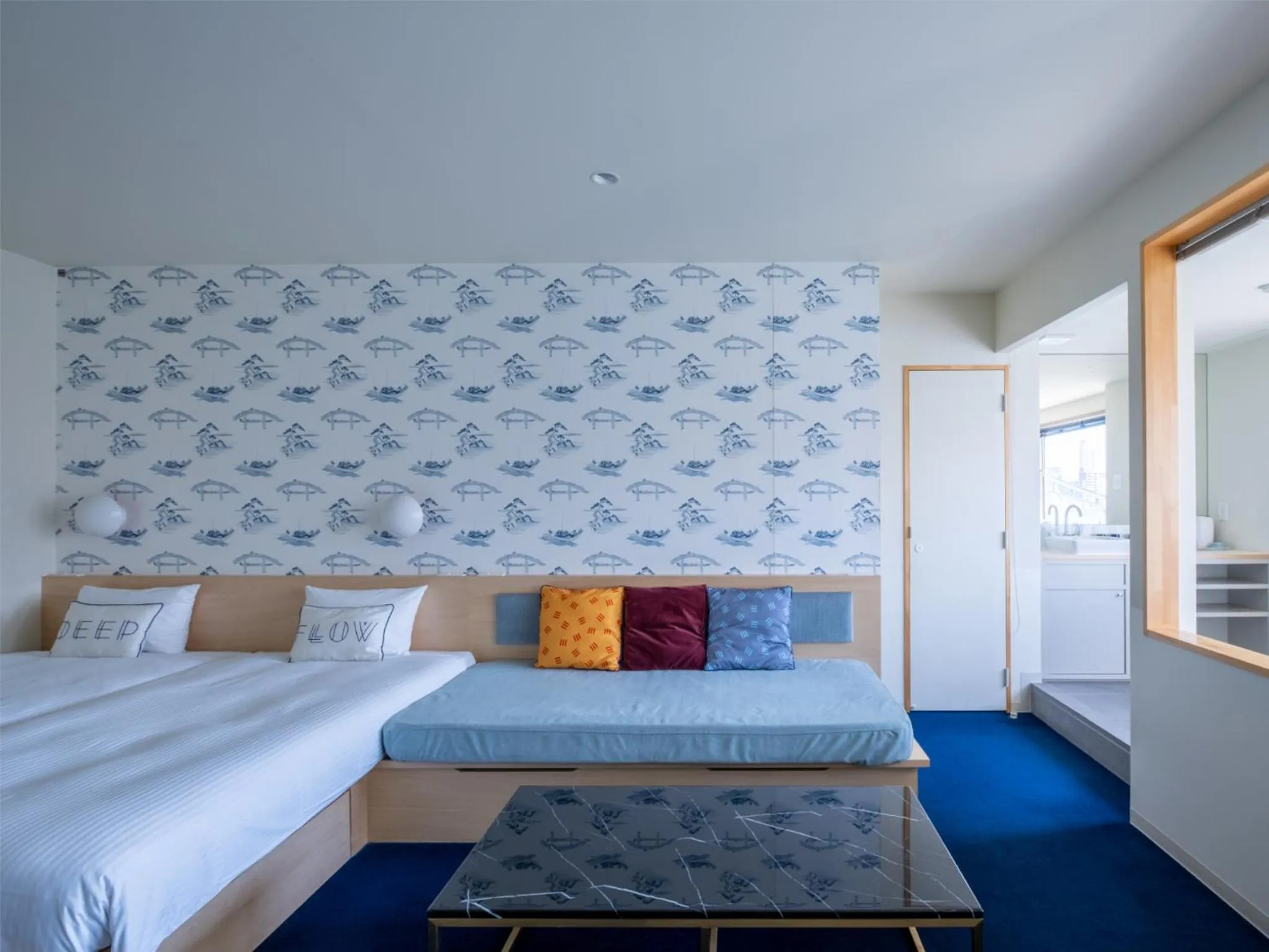 Bed in LYURO Tokyo Kiyosumi by THE SHARE HOTELS