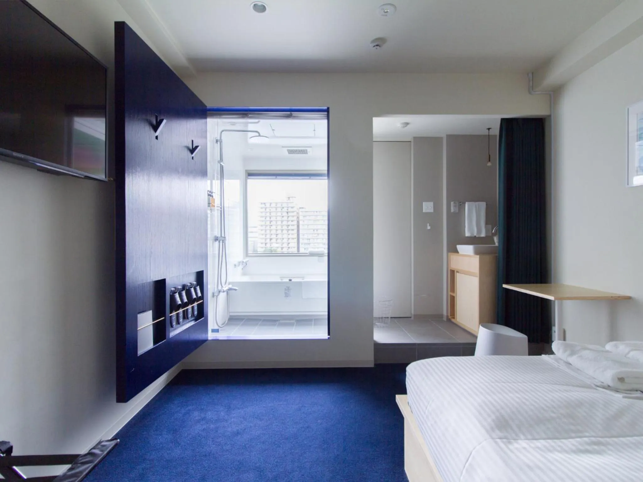 TV and multimedia, Bed in LYURO Tokyo Kiyosumi by THE SHARE HOTELS
