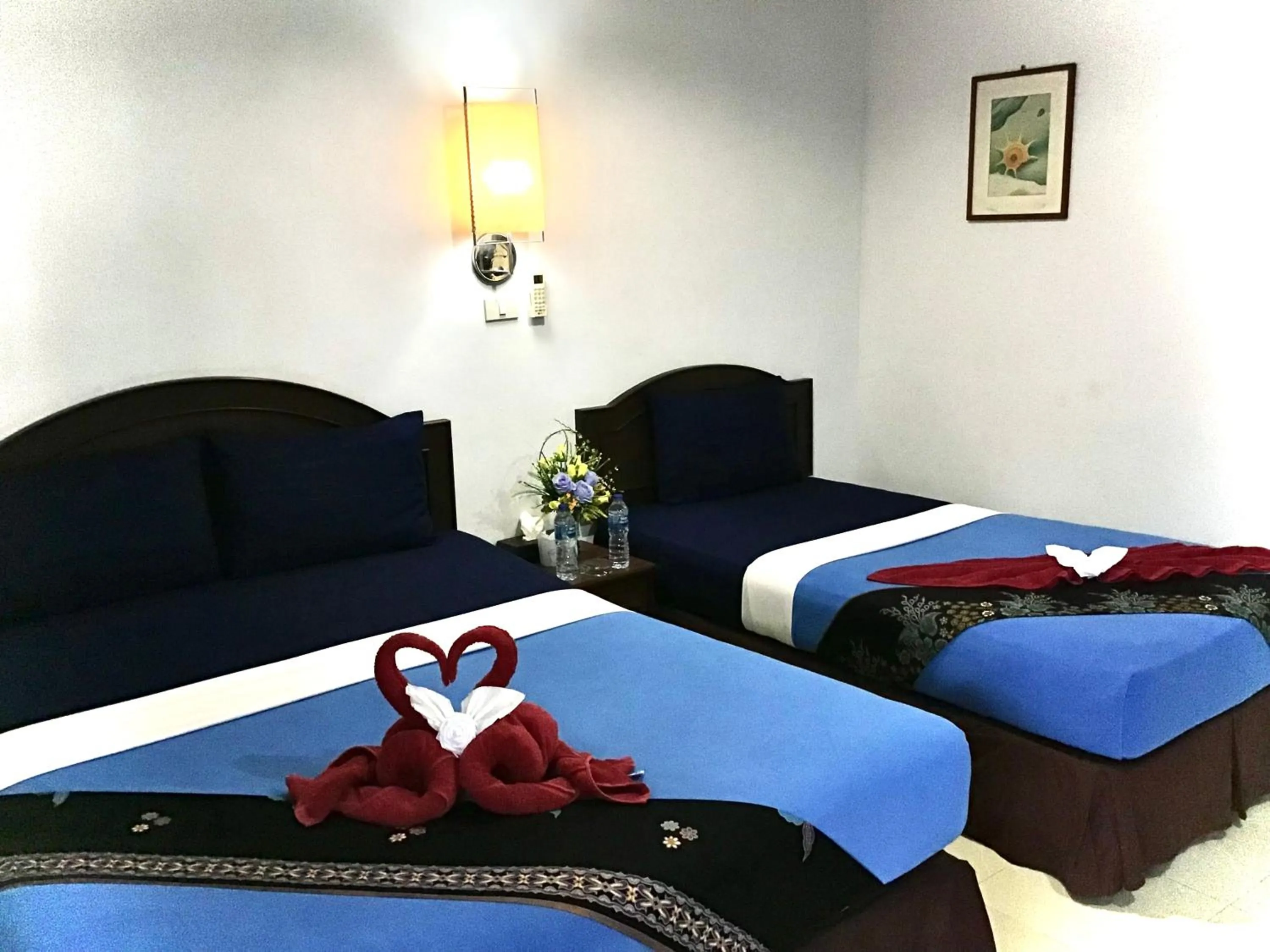 Bed in Andaman Beach Resort Koh Jum