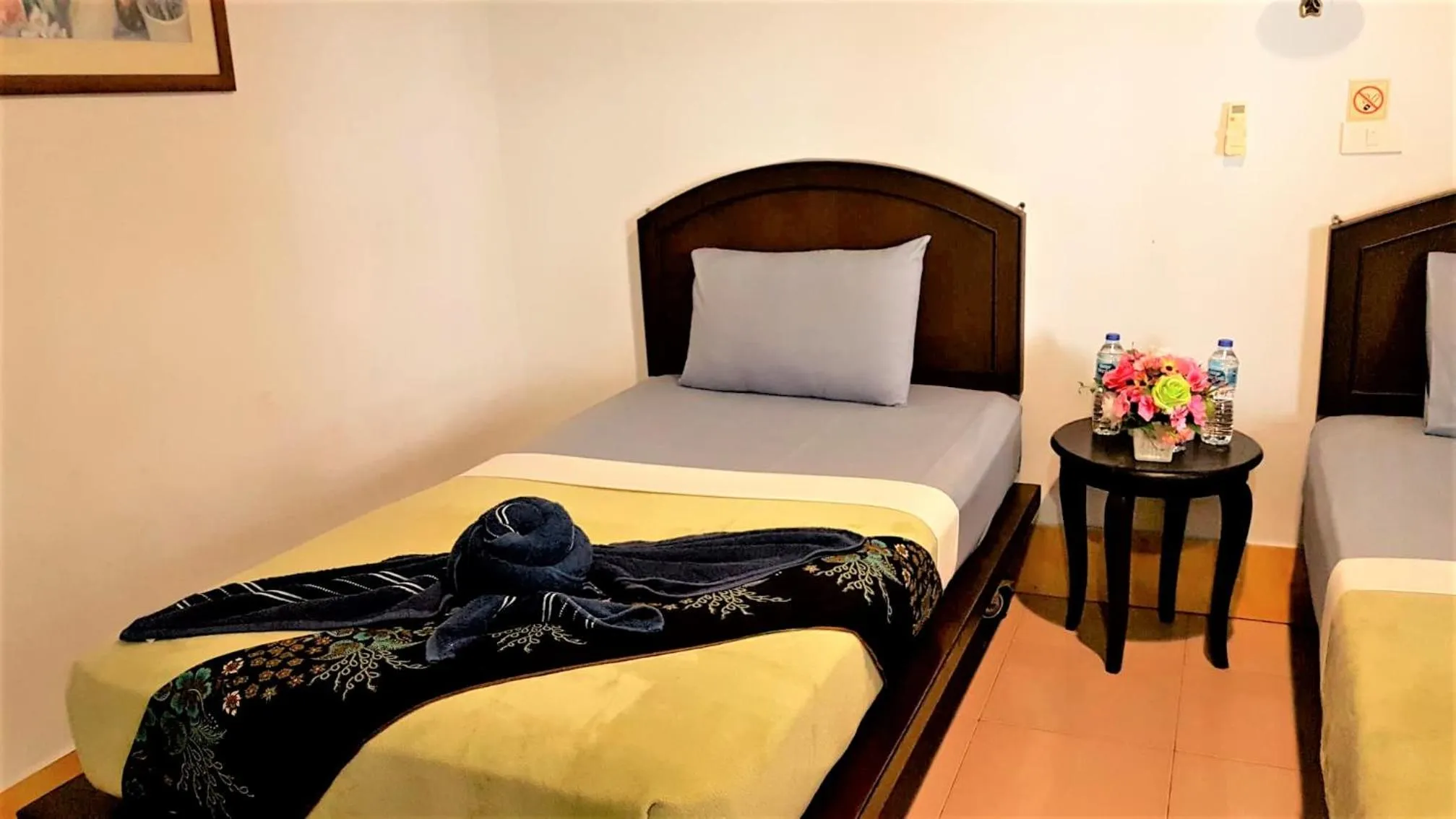 Bed in Andaman Beach Resort Koh Jum