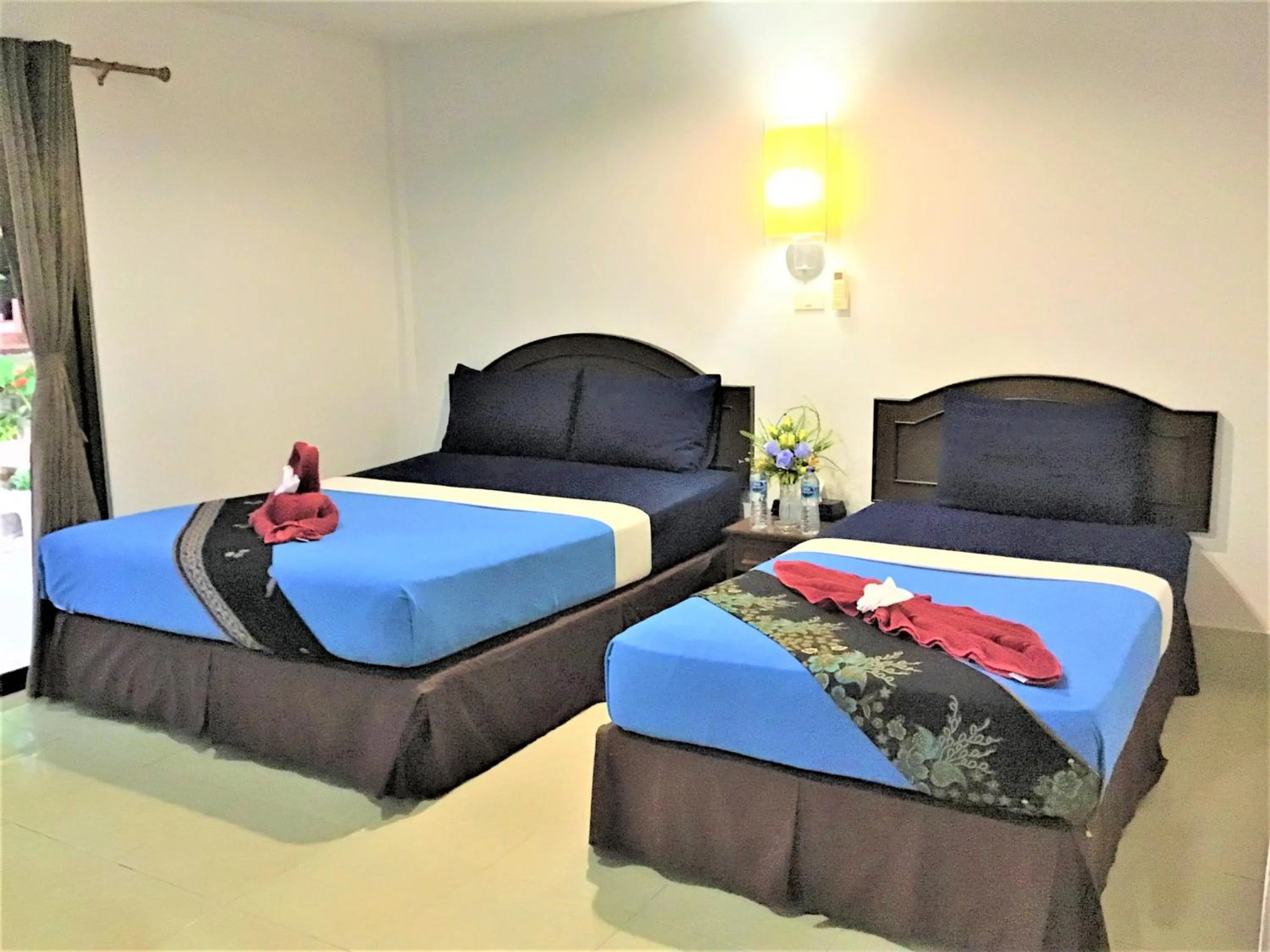 Bed in Andaman Beach Resort Koh Jum