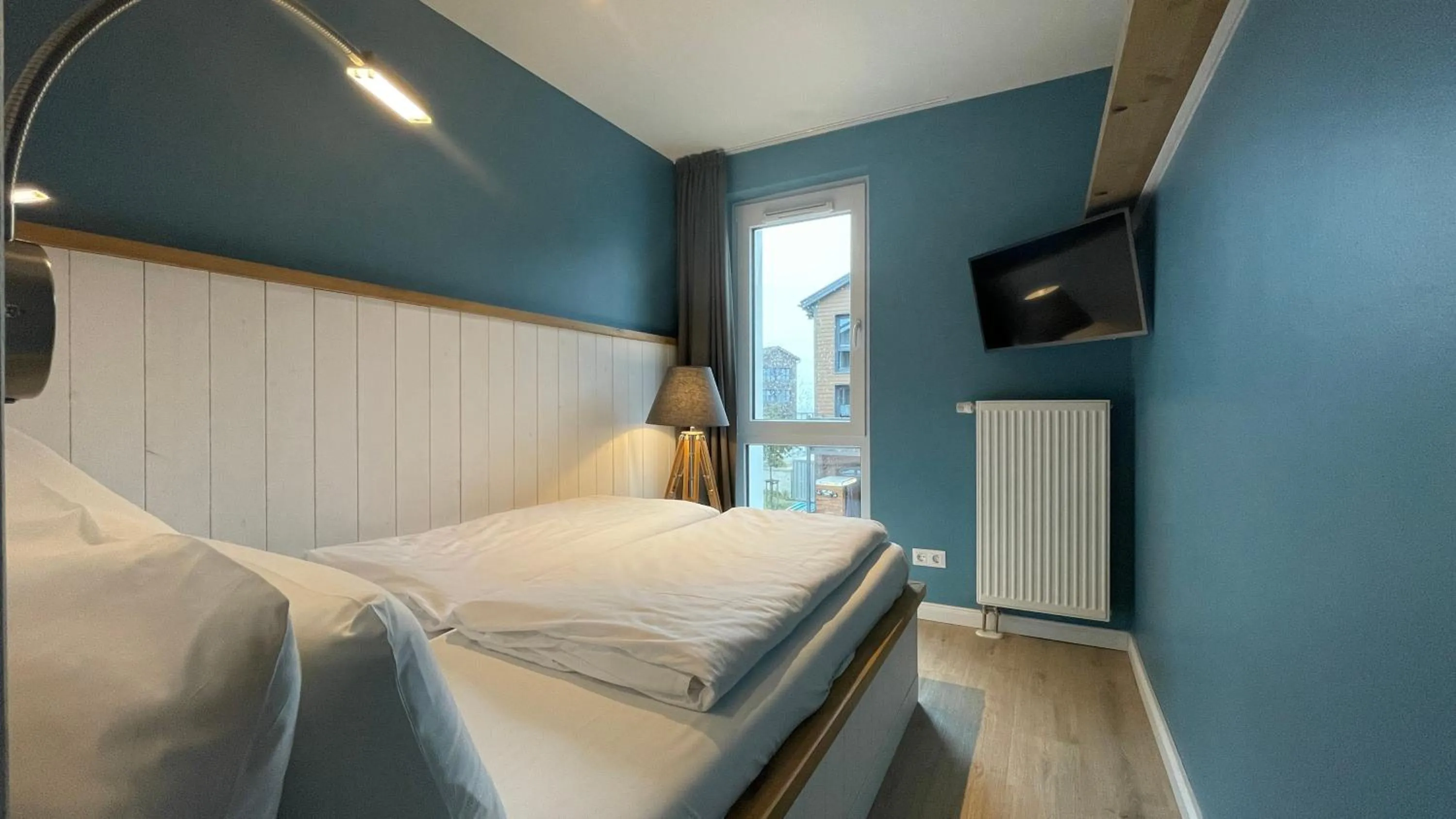 Bedroom, Bed in Beach Apartments Heiligenhafen