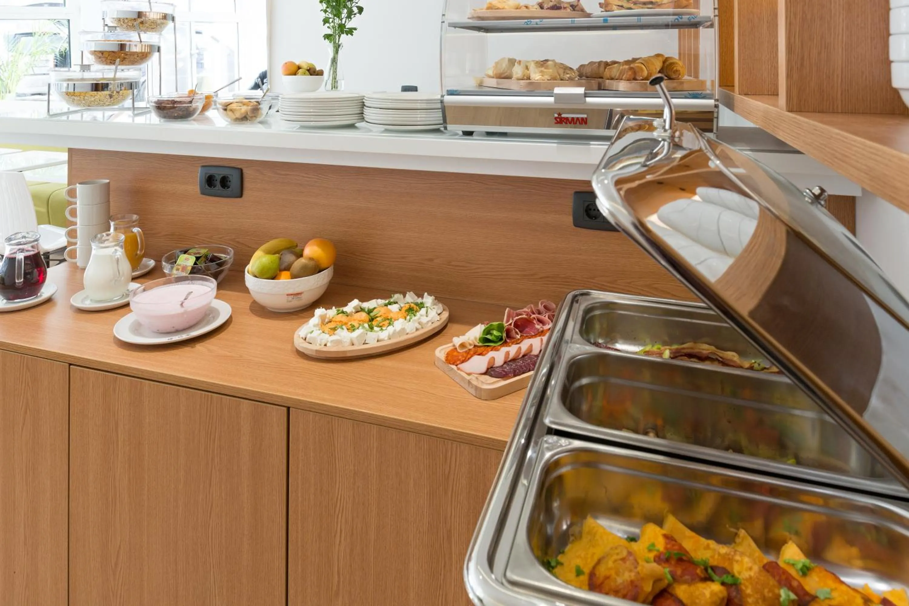 Buffet breakfast in Hotel TESLA - Smart Stay Garni