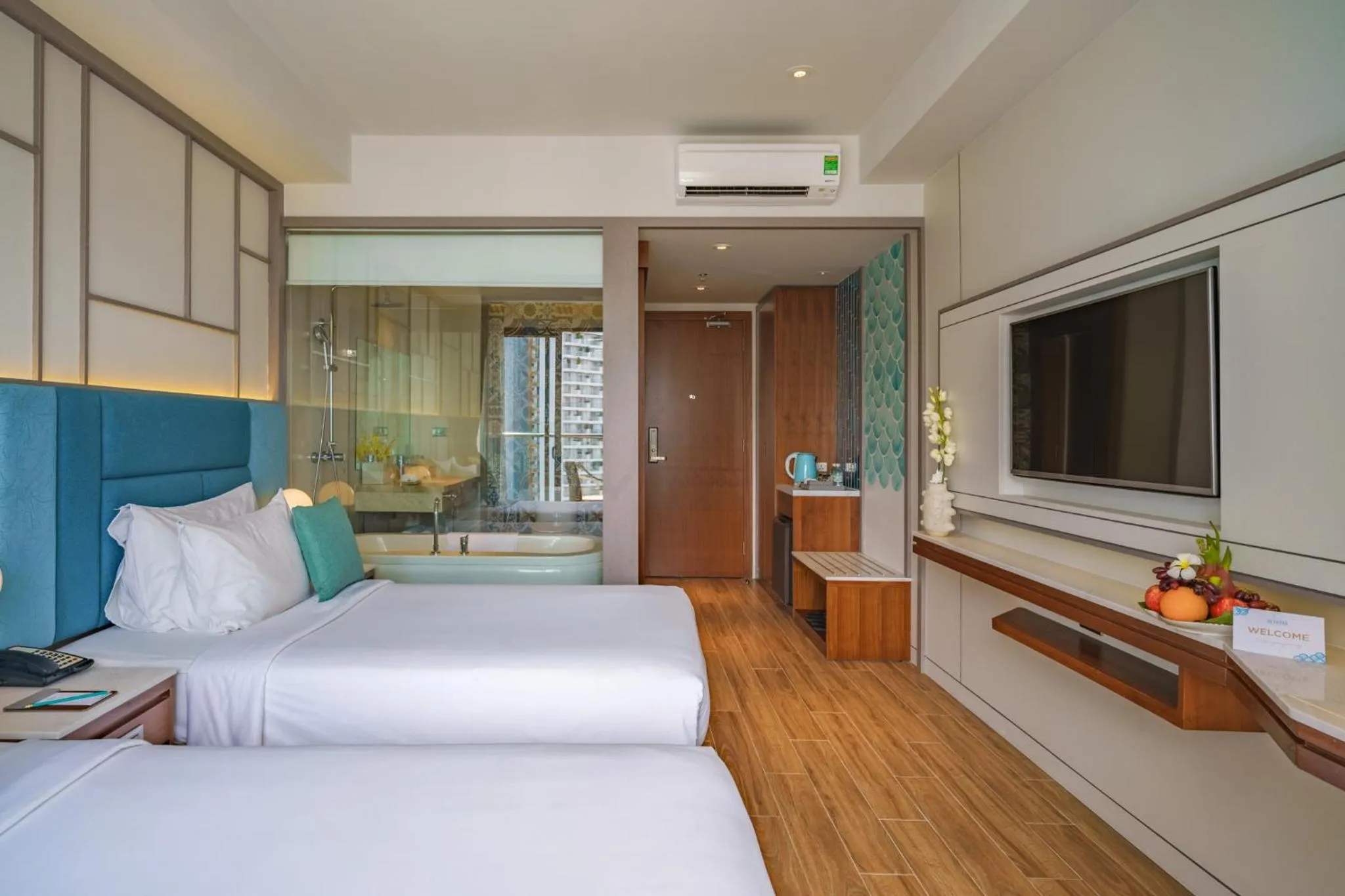 Photo of the whole room, Bed in Seaesta Nha Trang Hotel