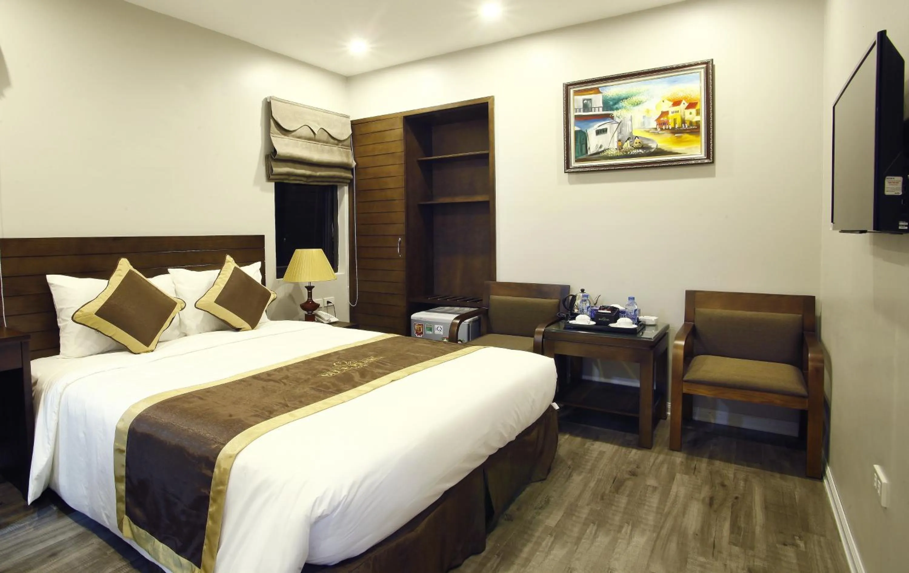 Bed in Blue Pearl West Hotel