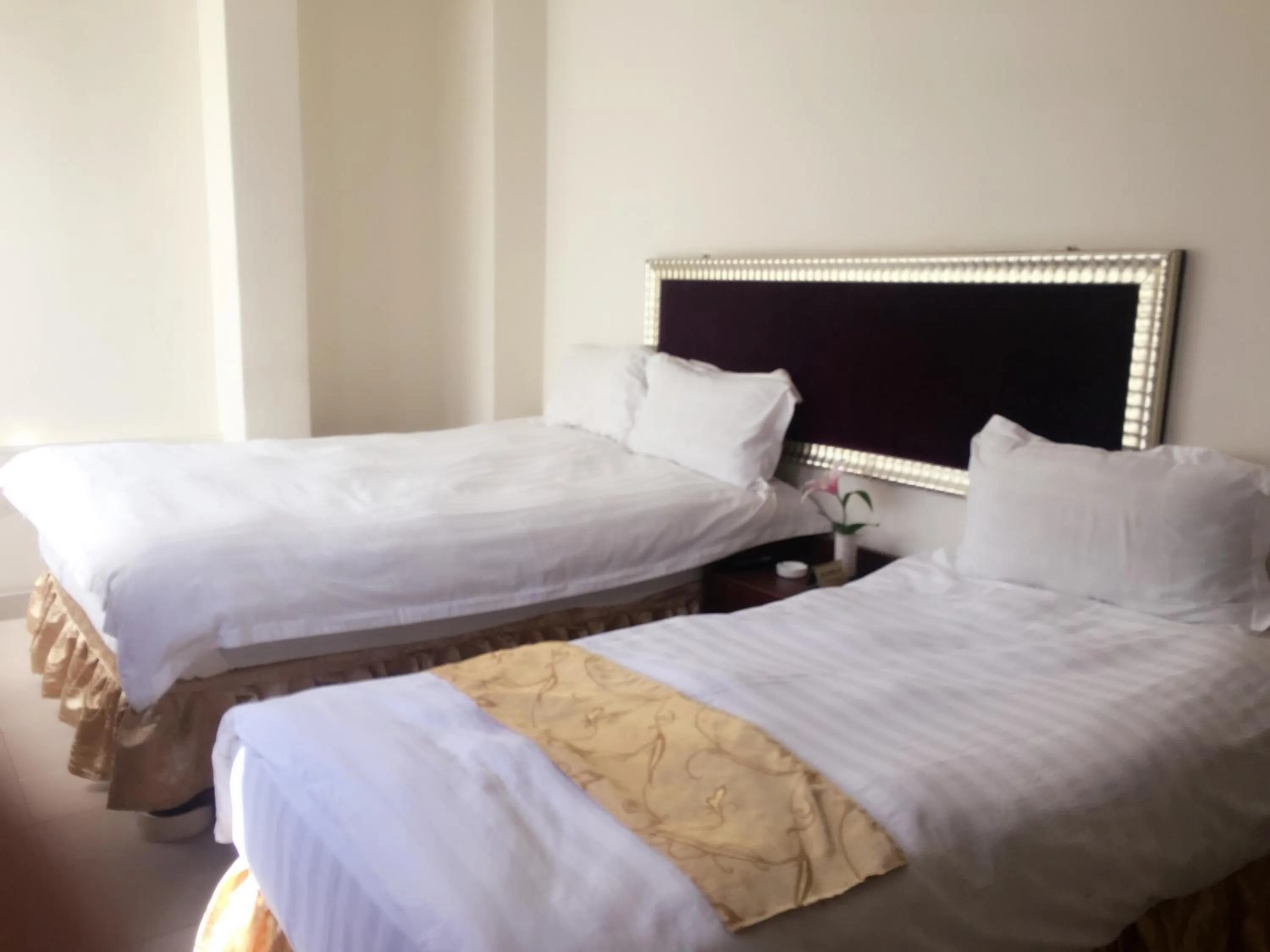 Bedroom in Shengtang Business Hotel