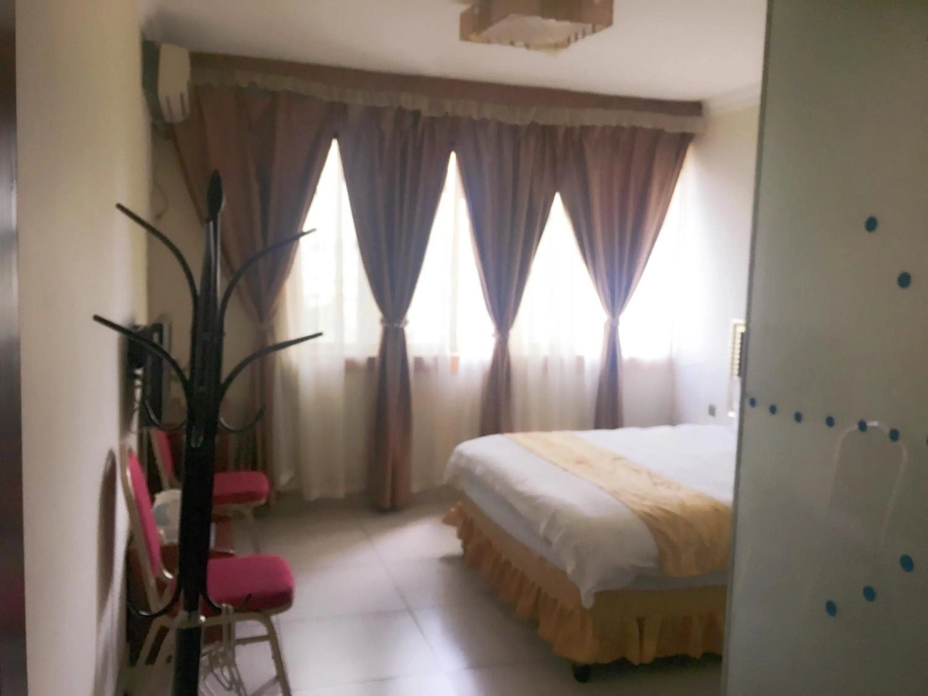 Bedroom in Shengtang Business Hotel