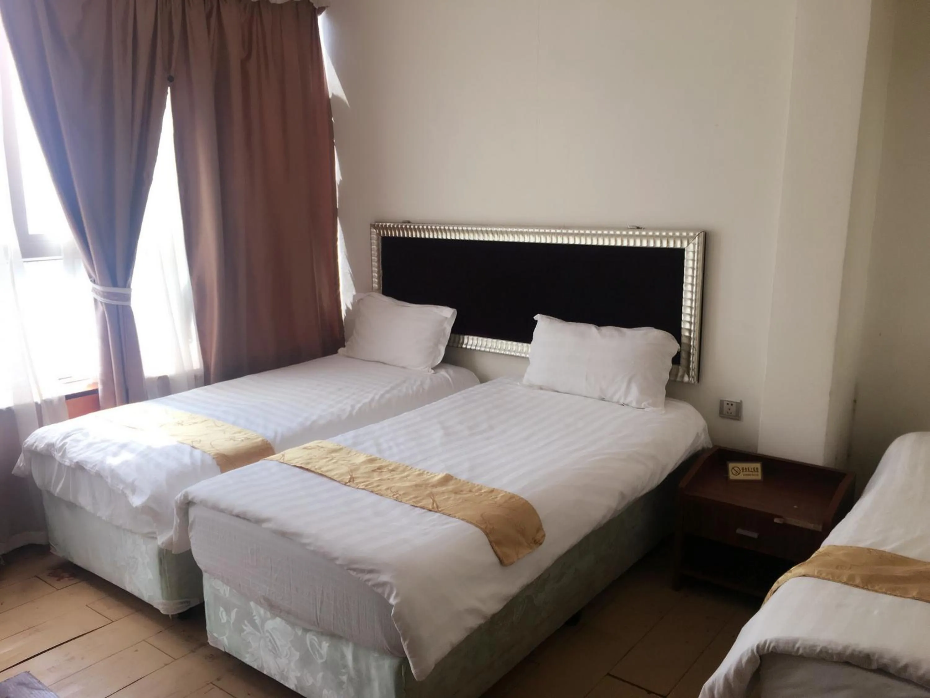 Bedroom in Shengtang Business Hotel