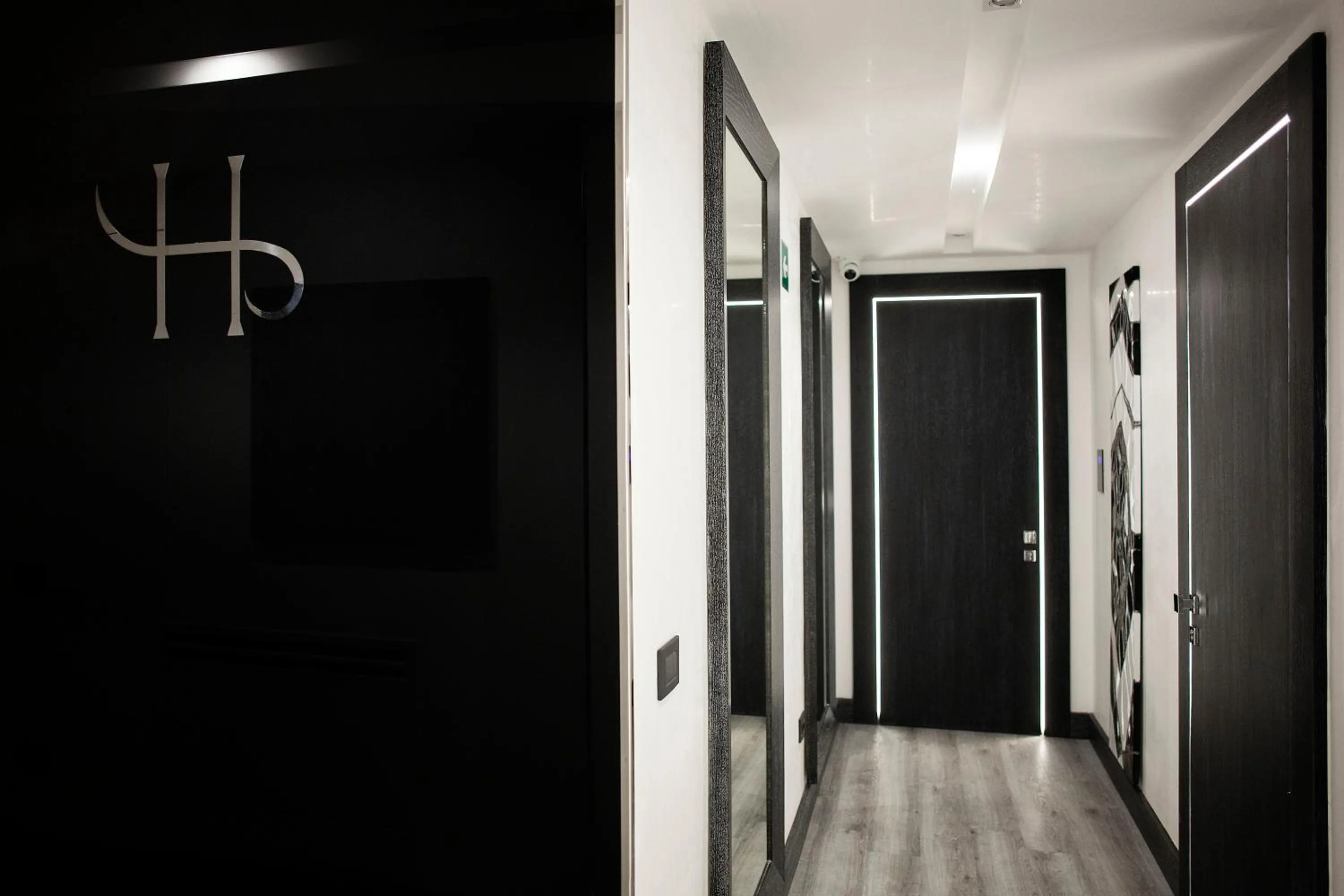 Property logo or sign in LHP Suite Napoli Parco Margherita