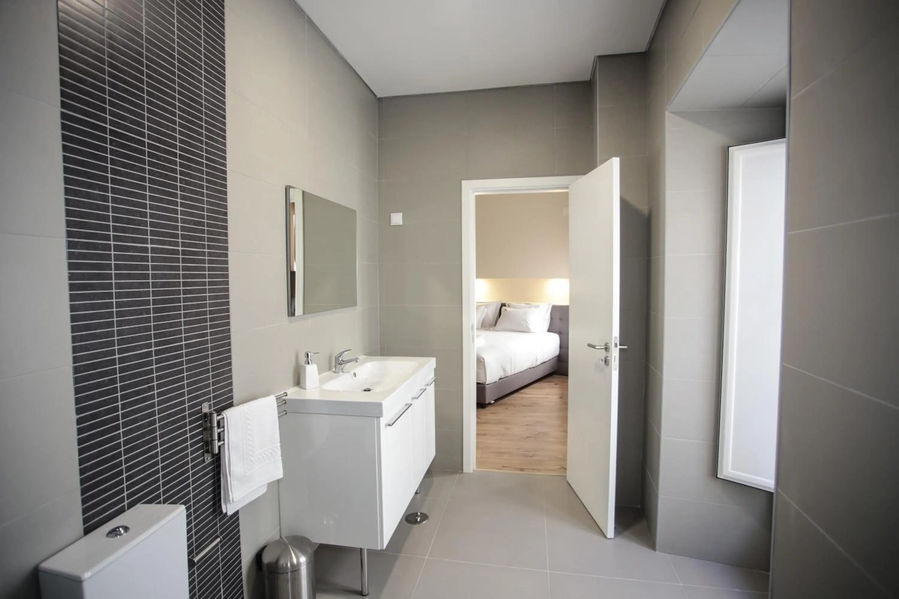 Bathroom, Bed in Suites Guest House
