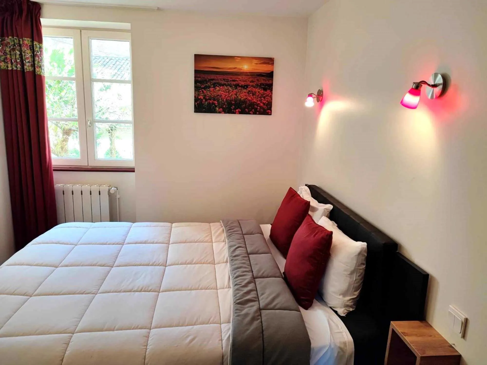 Bedroom in Hôtel Jean XXII