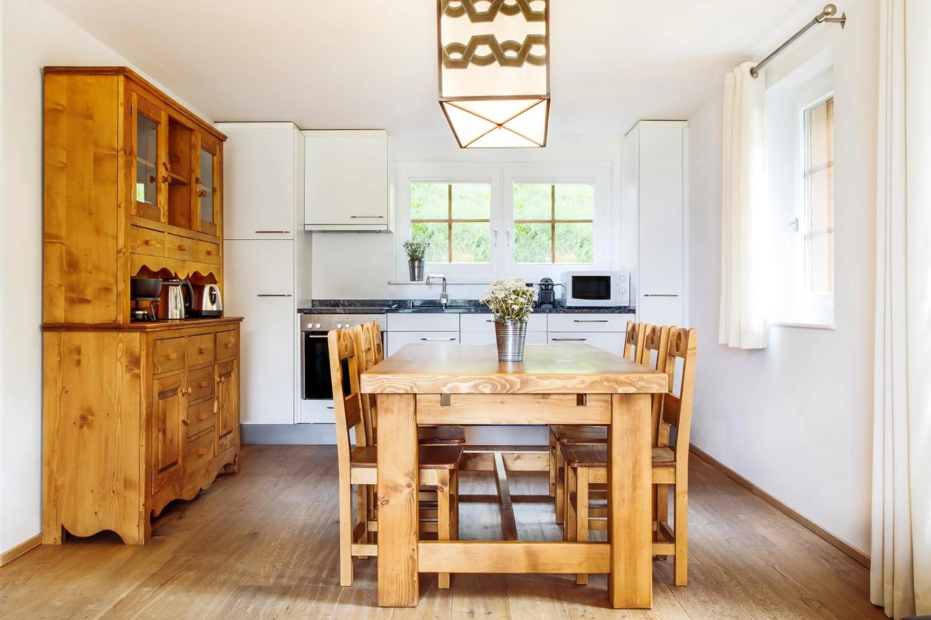 Kitchen or kitchenette in Chandolin Boutique Hotel