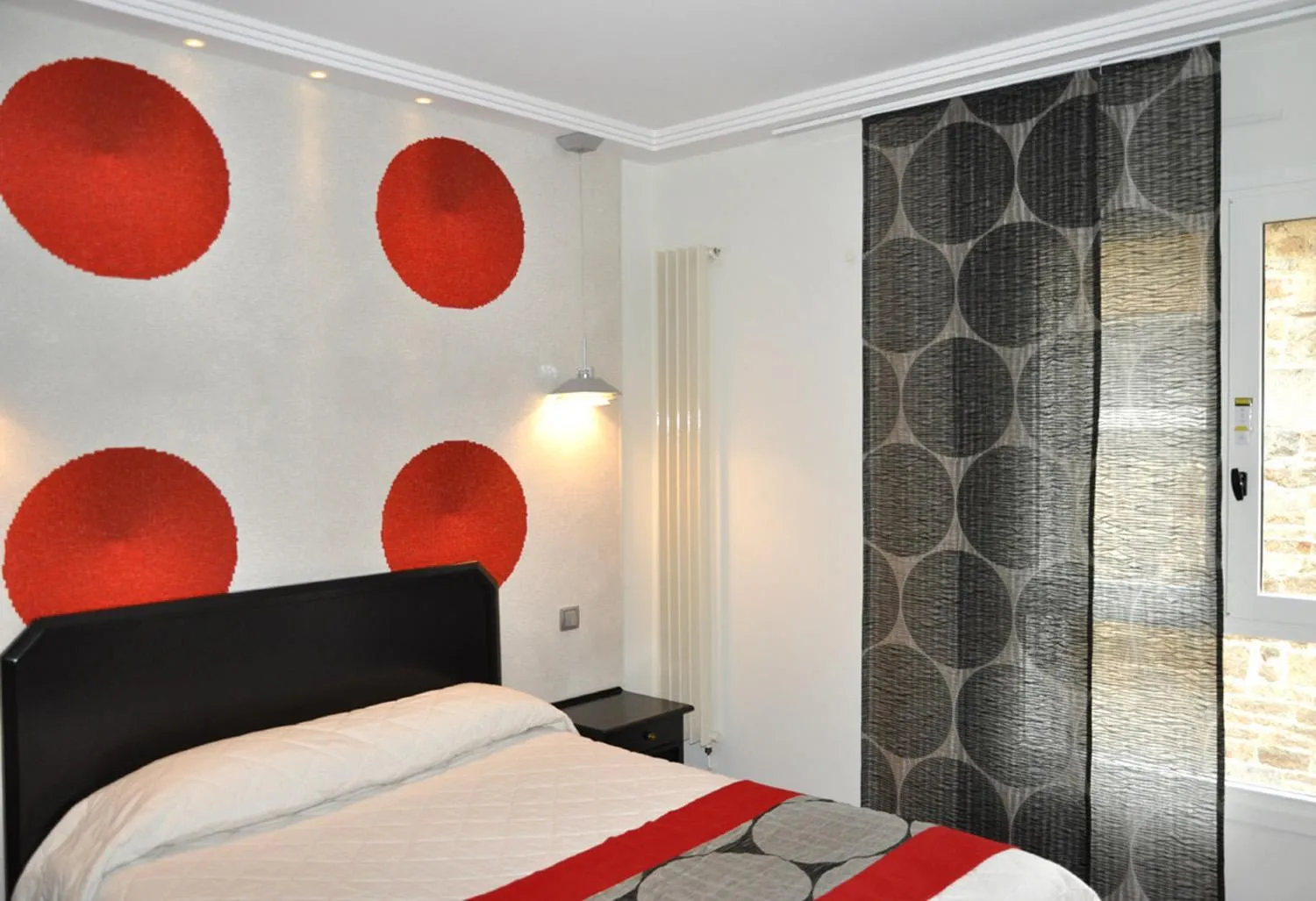 Bed in Logis Hôtel Restaurant Le Fruitier