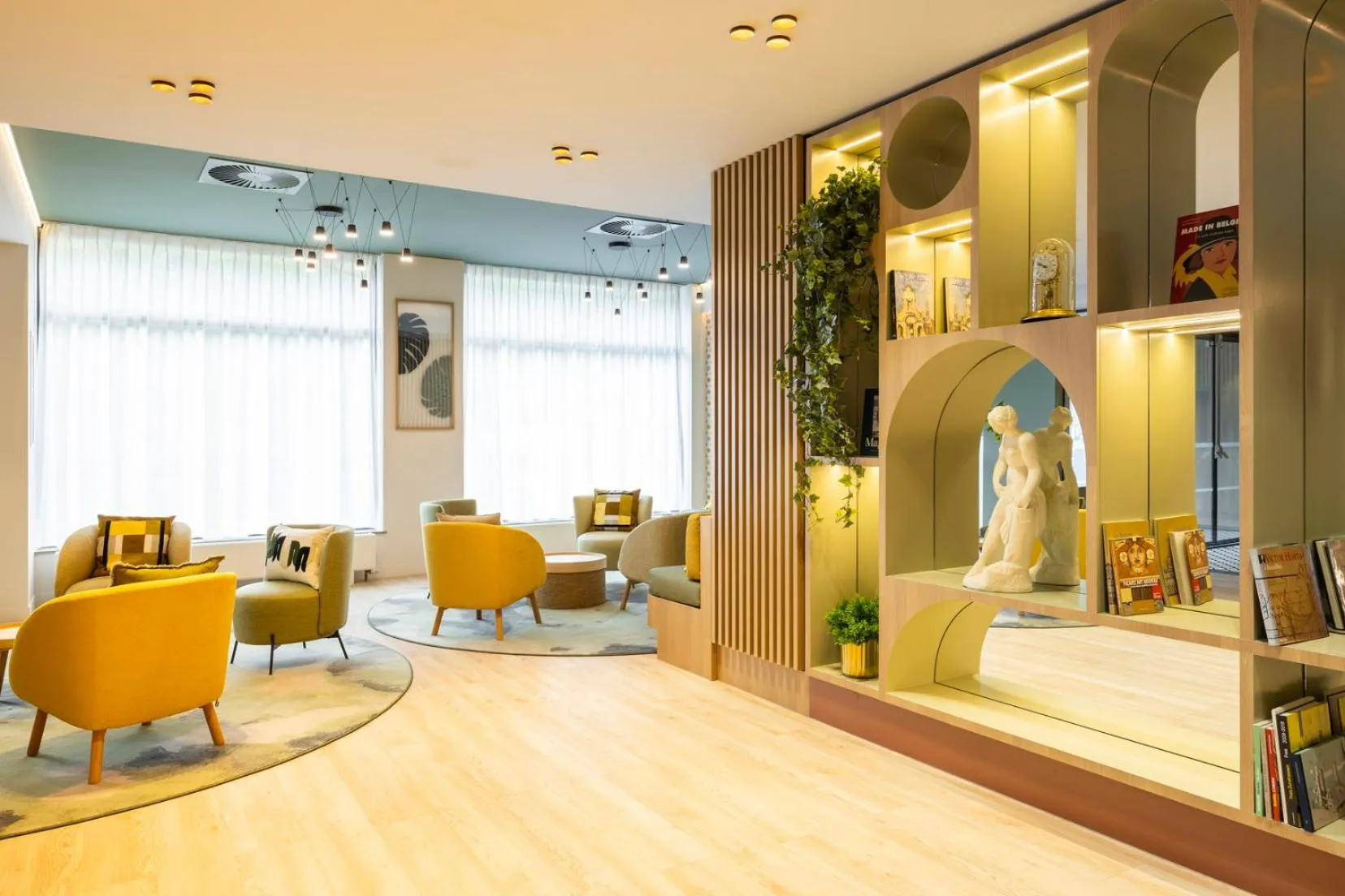 Lobby or reception in Citadines Toison d'Or Brussels