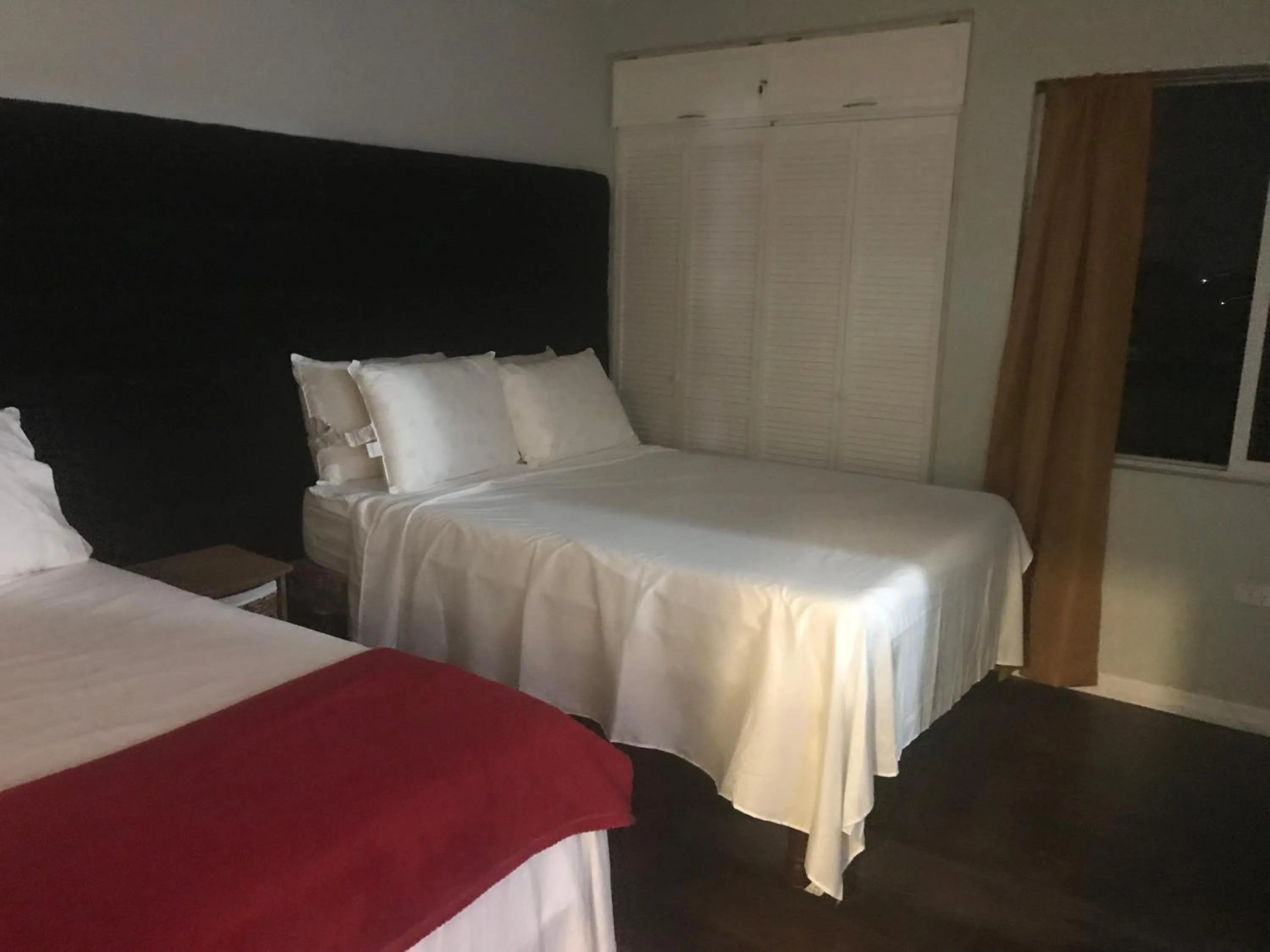 Bed in Abacus Jamaica the Zana Suites