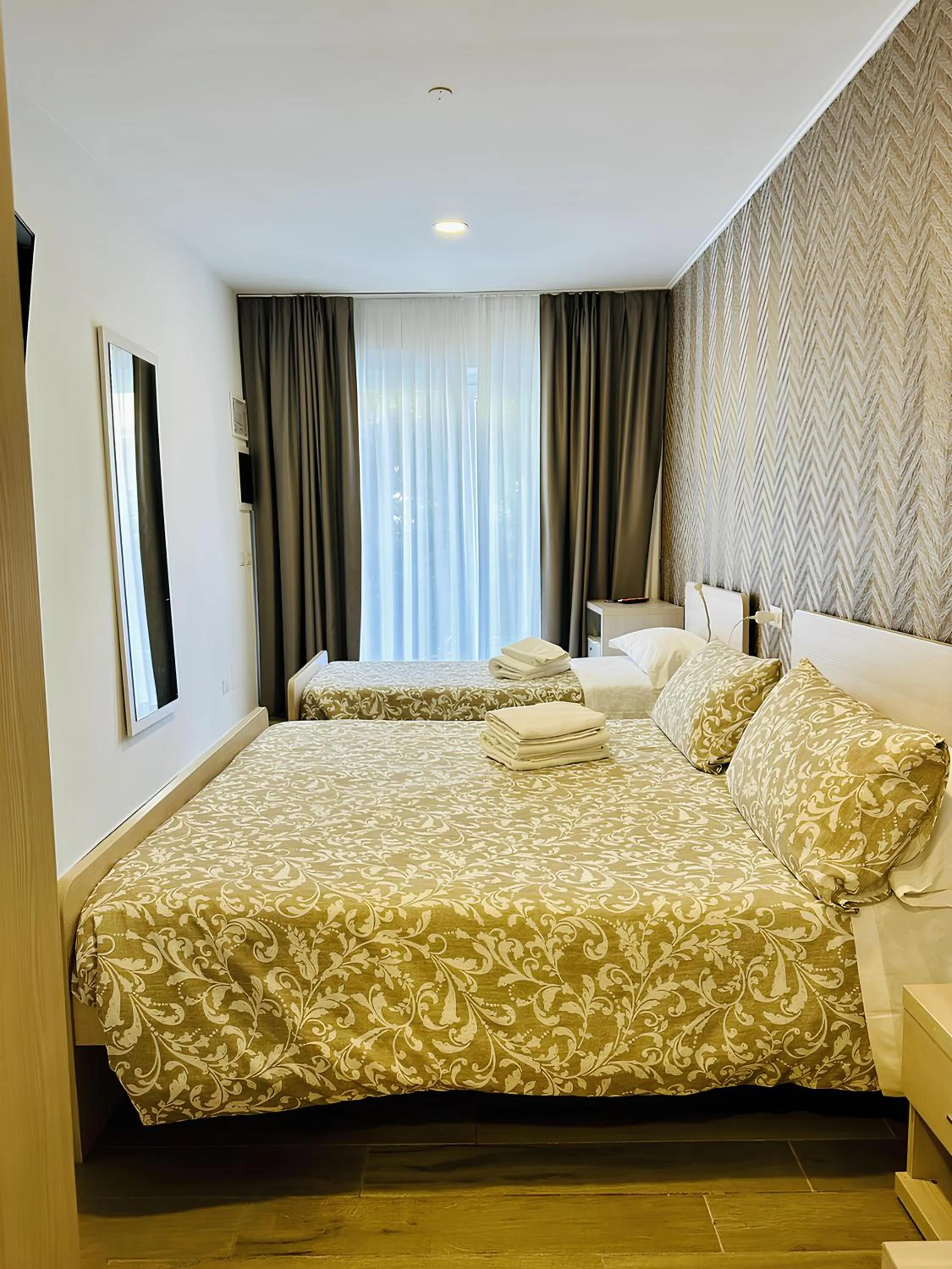 Bed in Academy Hotel