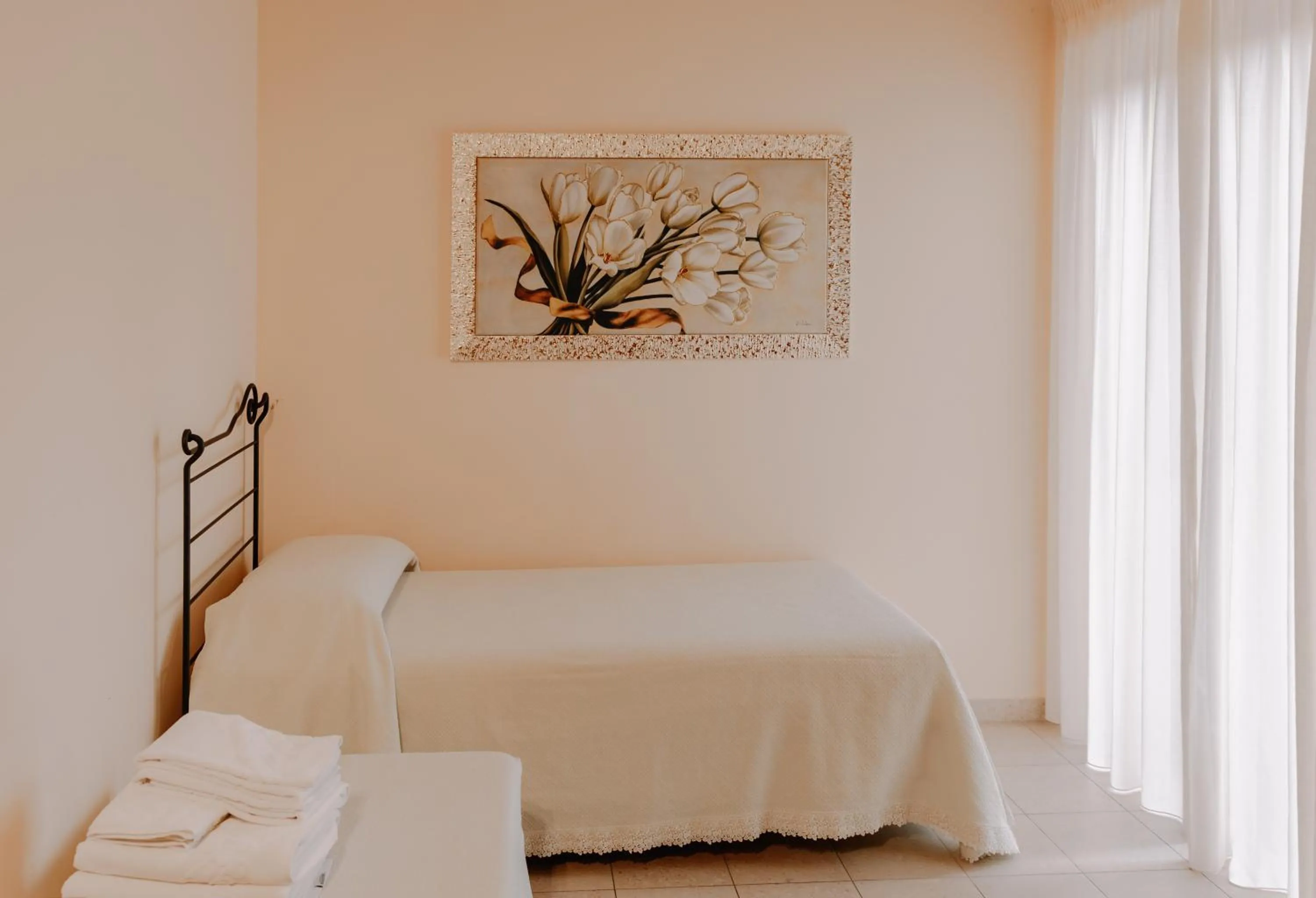 Bed in San Raffaele Hotel Restaurant & Resort