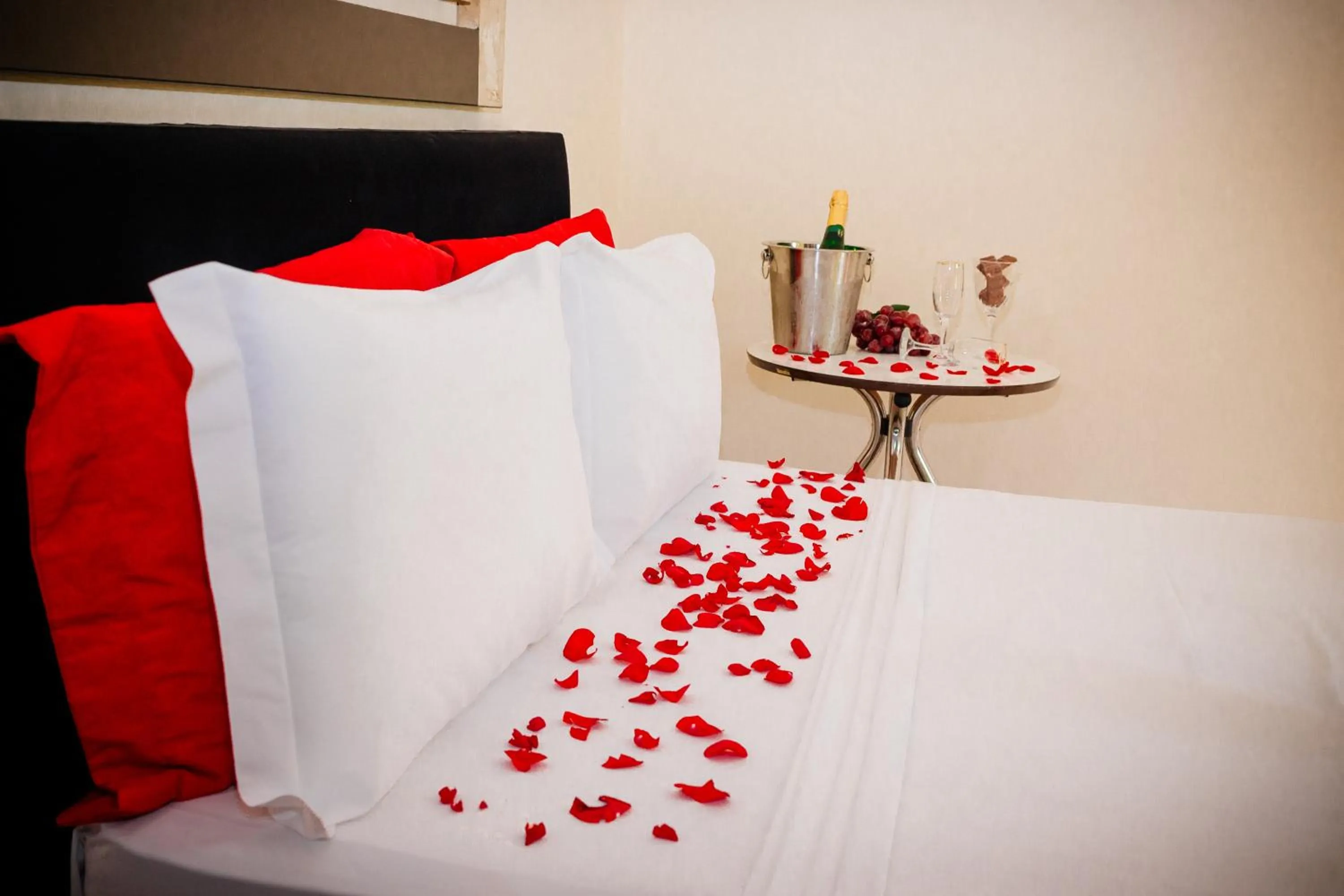 Bed in Gabvini Hotel