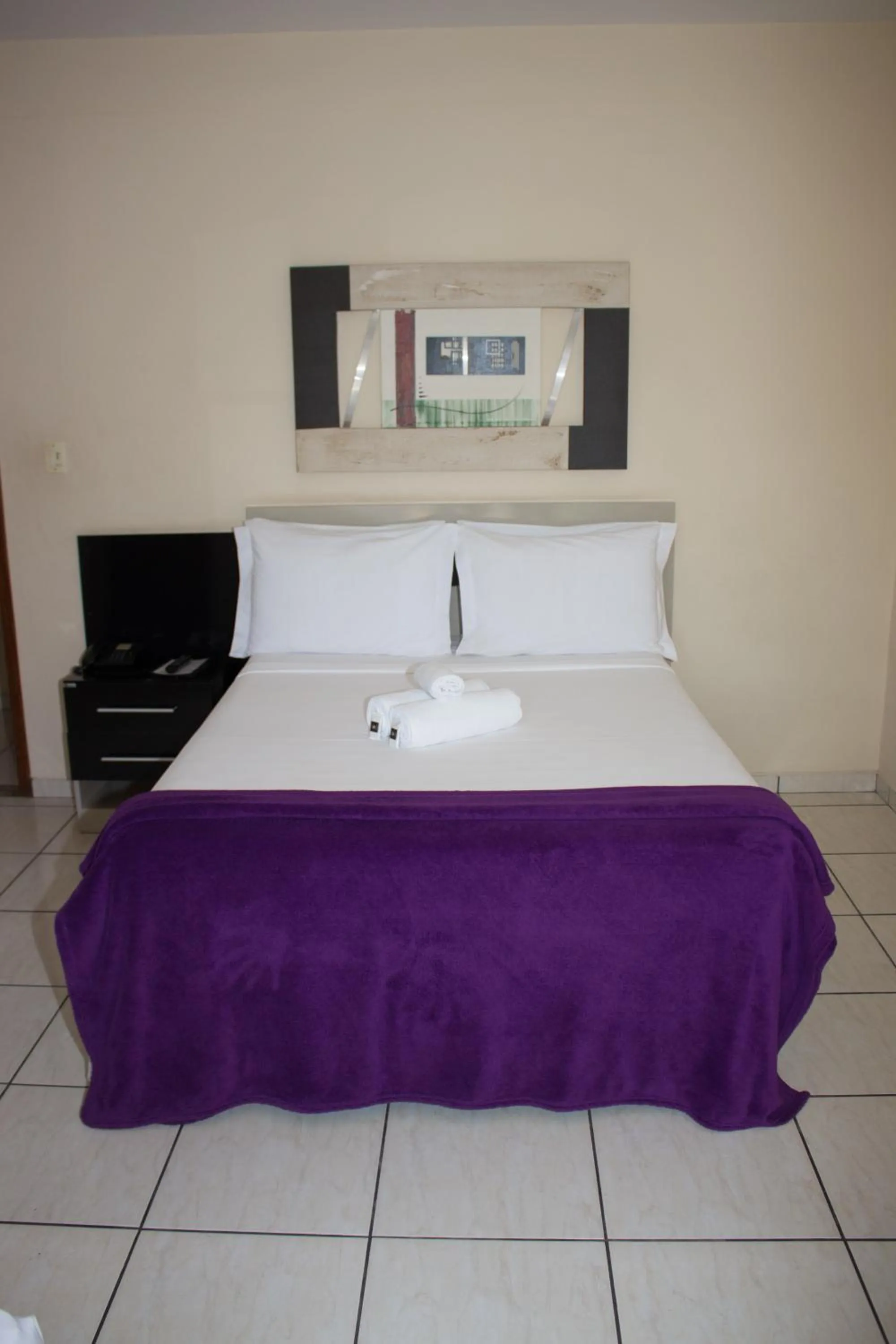 Bed in Gabvini Hotel