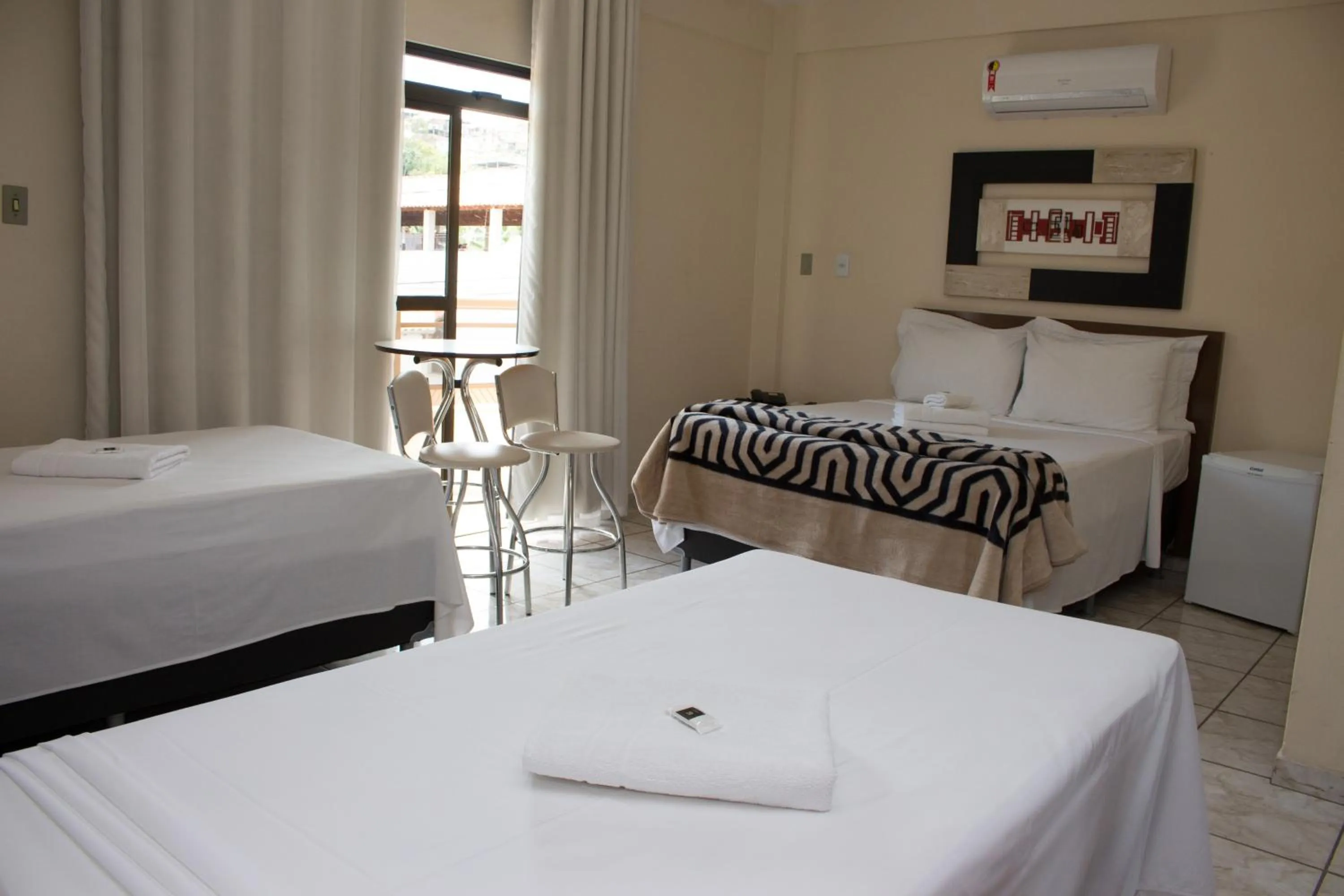 Bed in Gabvini Hotel