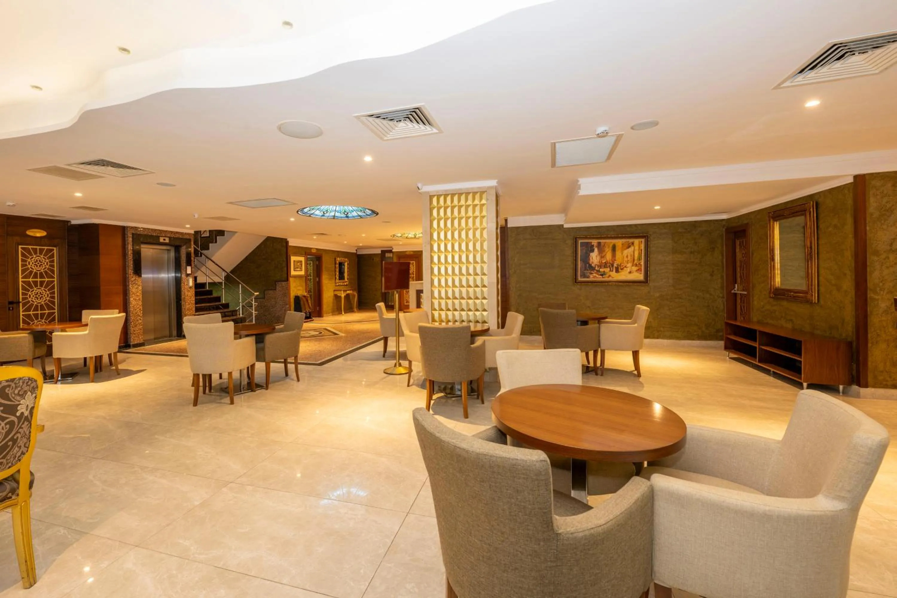 Communal lounge/ TV room in Dalan Otel