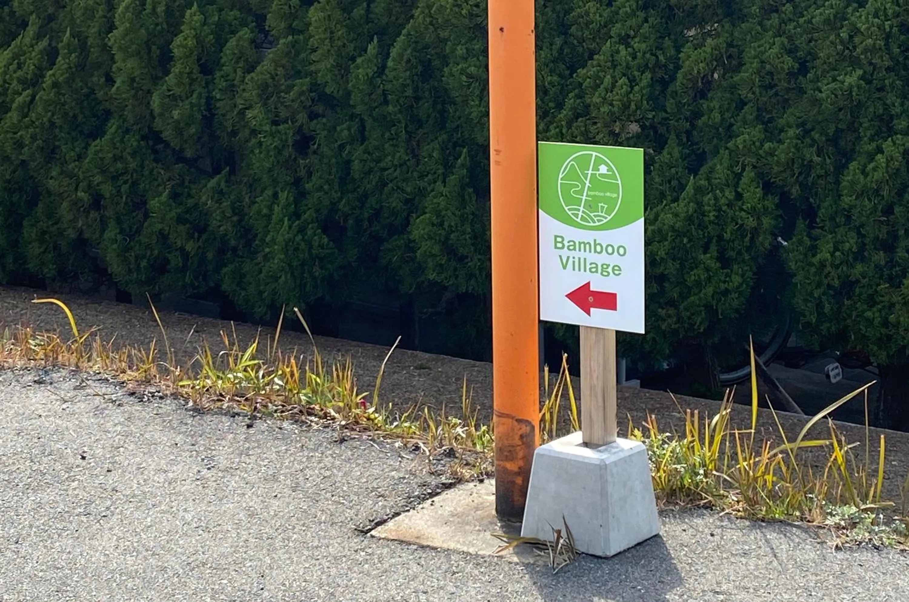 Property logo or sign in Bamboo Village Guest House