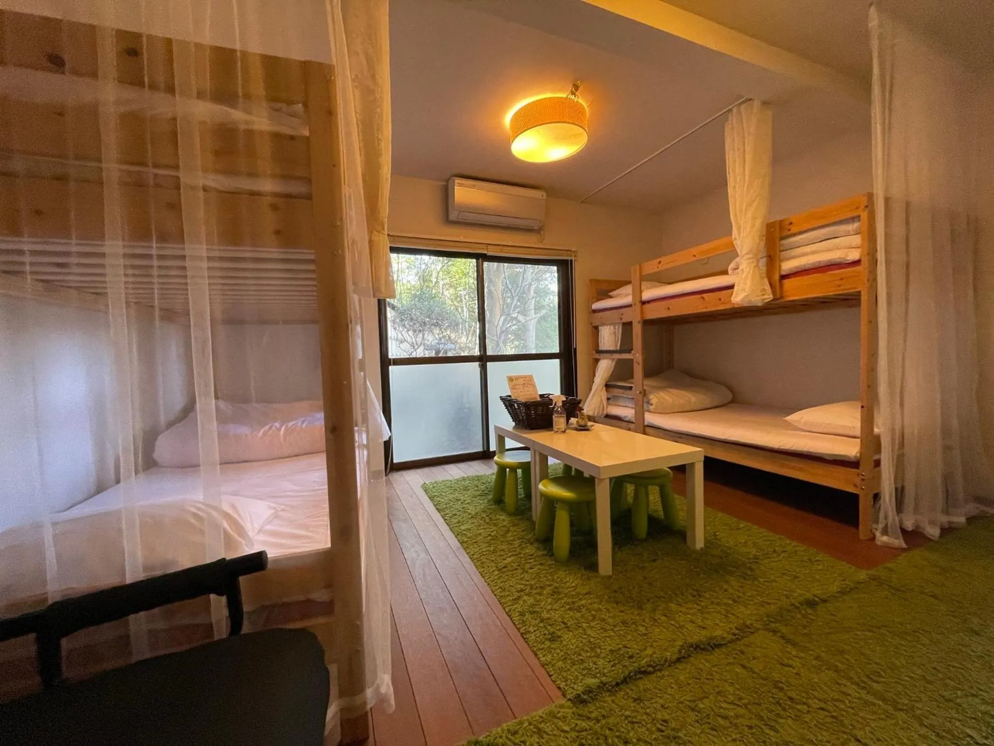 Bed in Bamboo Village Guest House