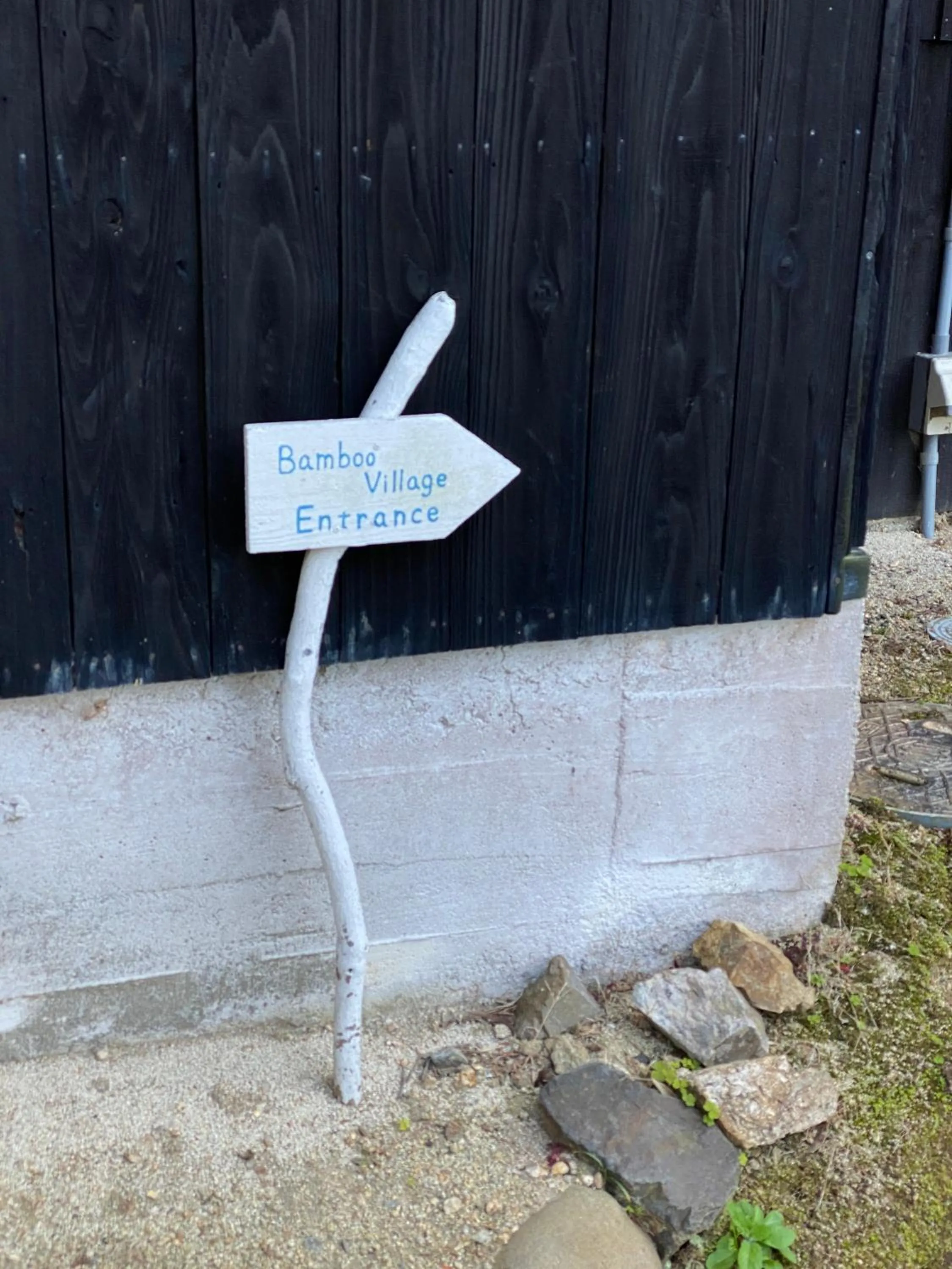 Property logo or sign in Bamboo Village Guest House