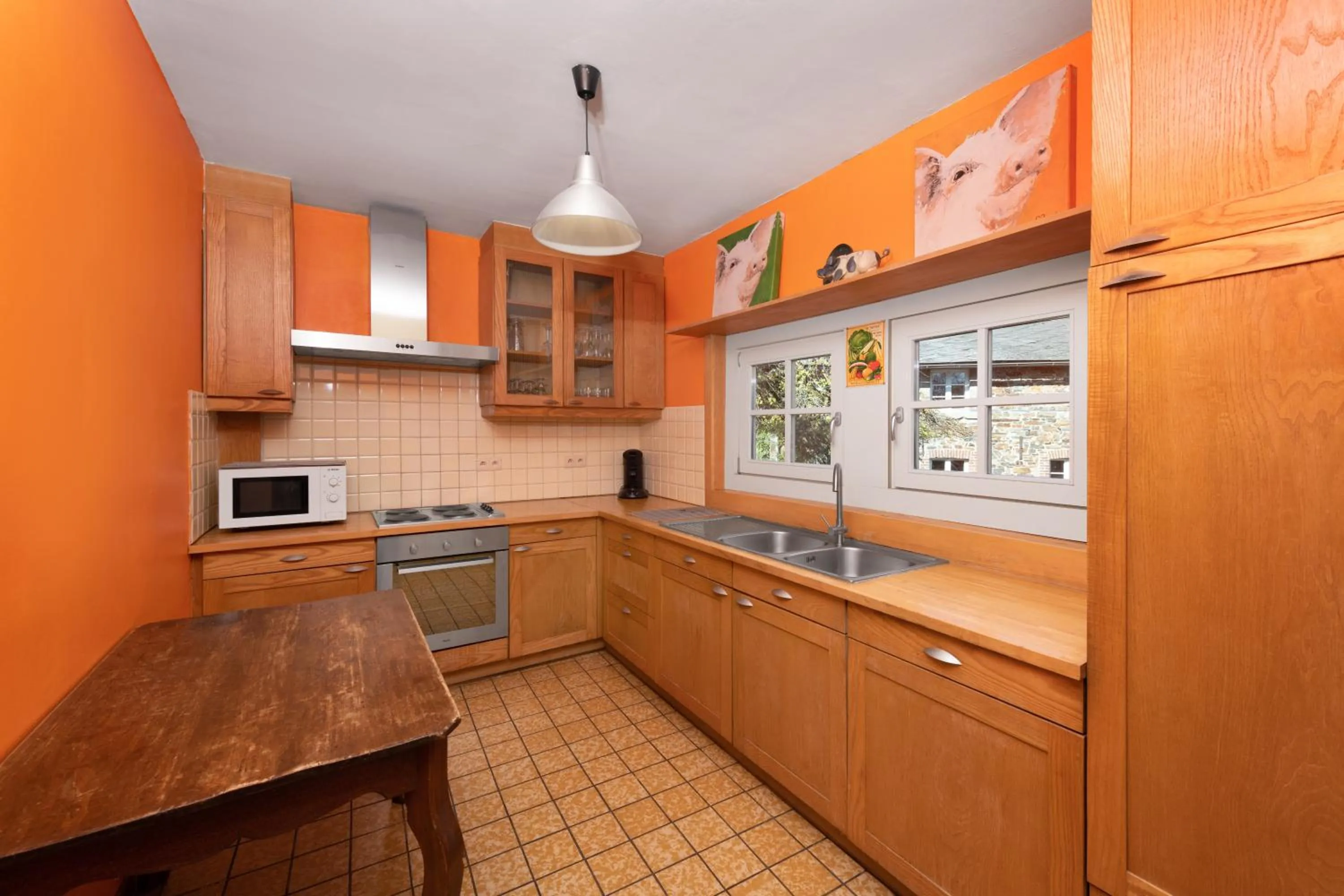 Kitchen or kitchenette in Hotel Aux Ecuries De La Reine