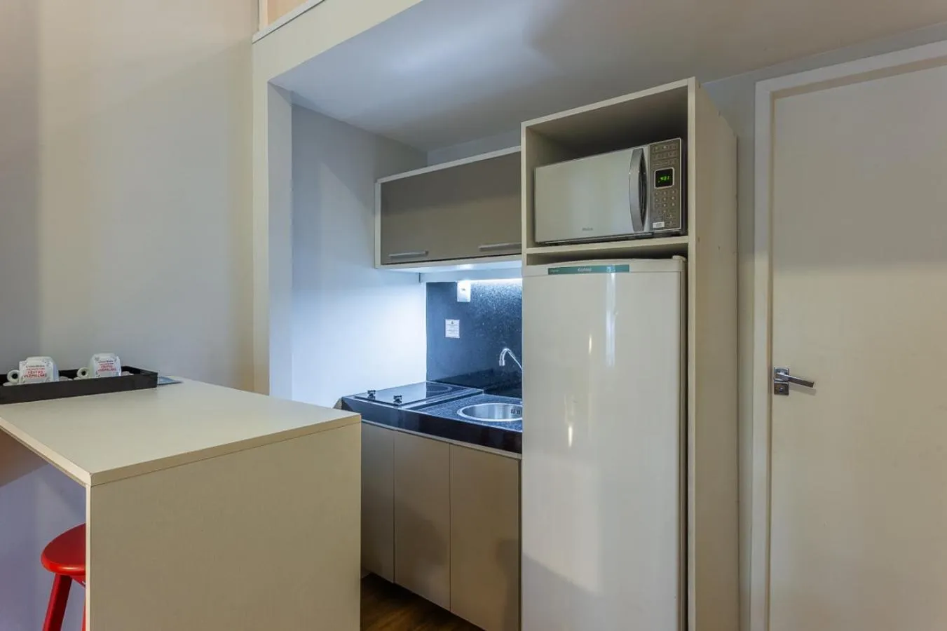 Kitchen or kitchenette in Injoy Lofts & Studios Ipanema