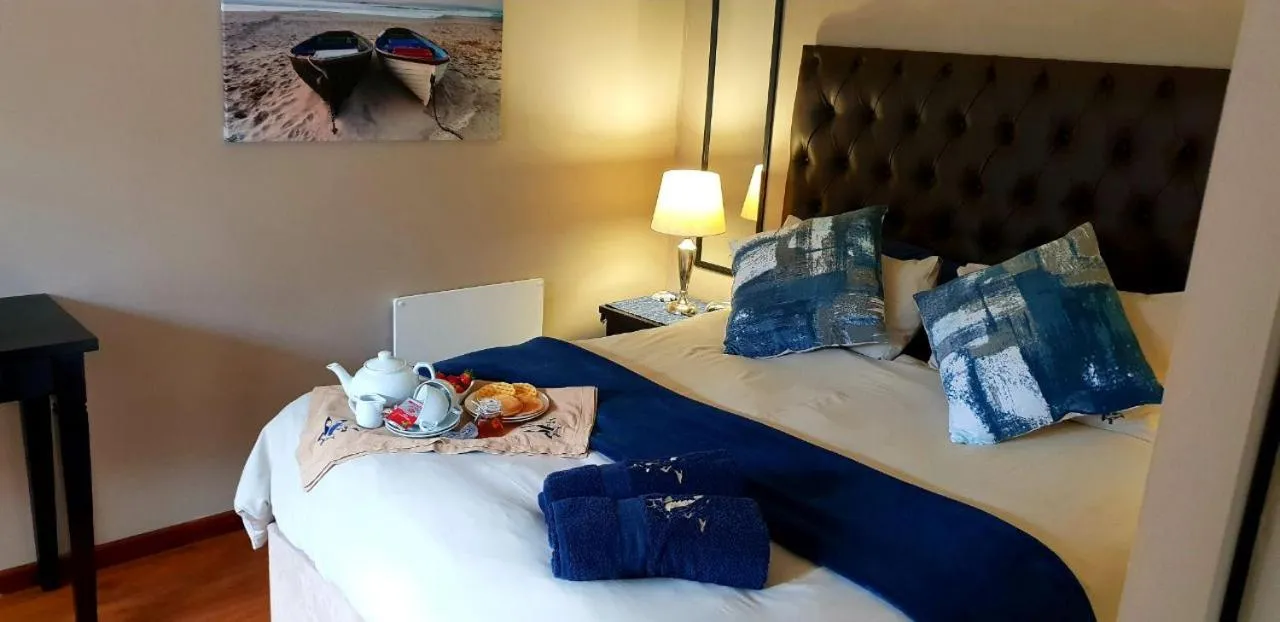 Bed in Seagulls Guest House