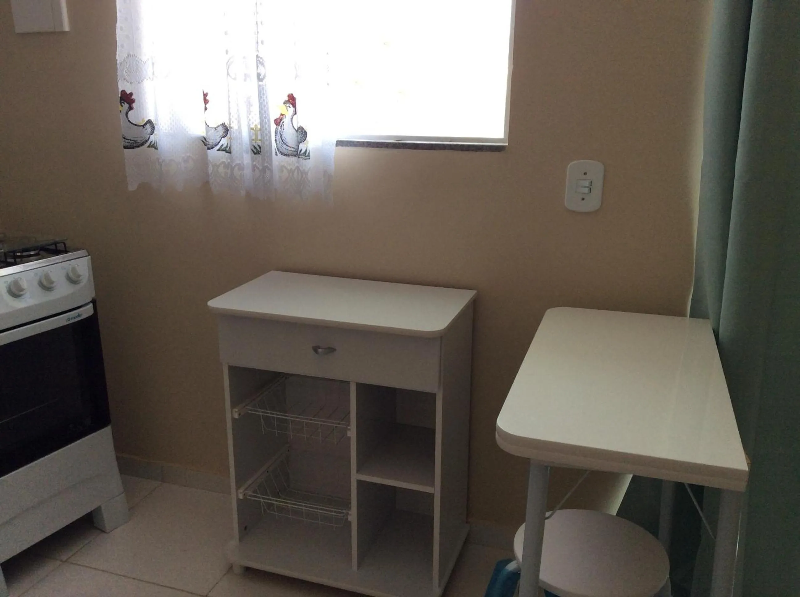 Kitchen or kitchenette in Quitieenete Arraial do Cabo