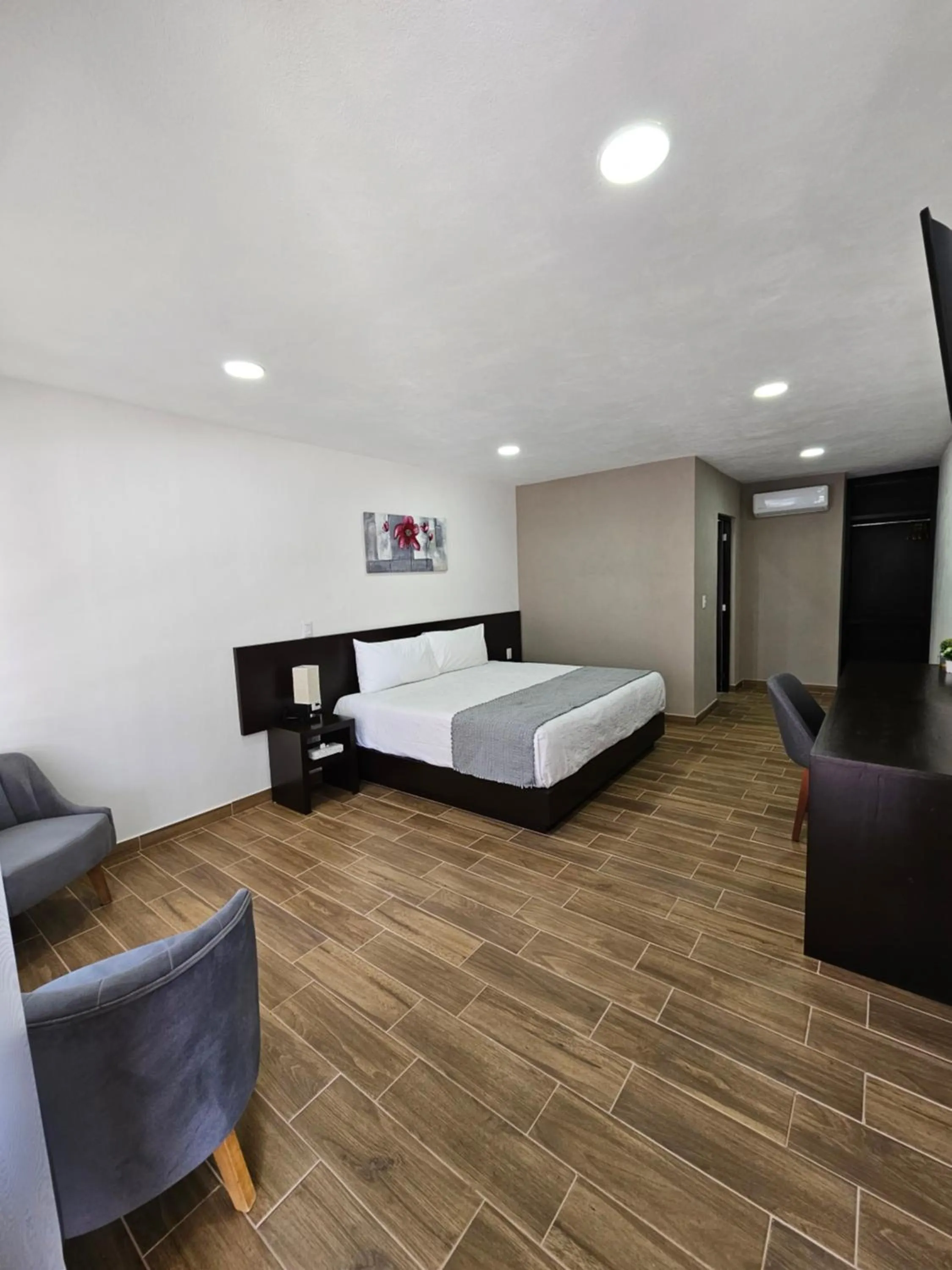 Bed in Hotel Ejecutivo Aeropuerto