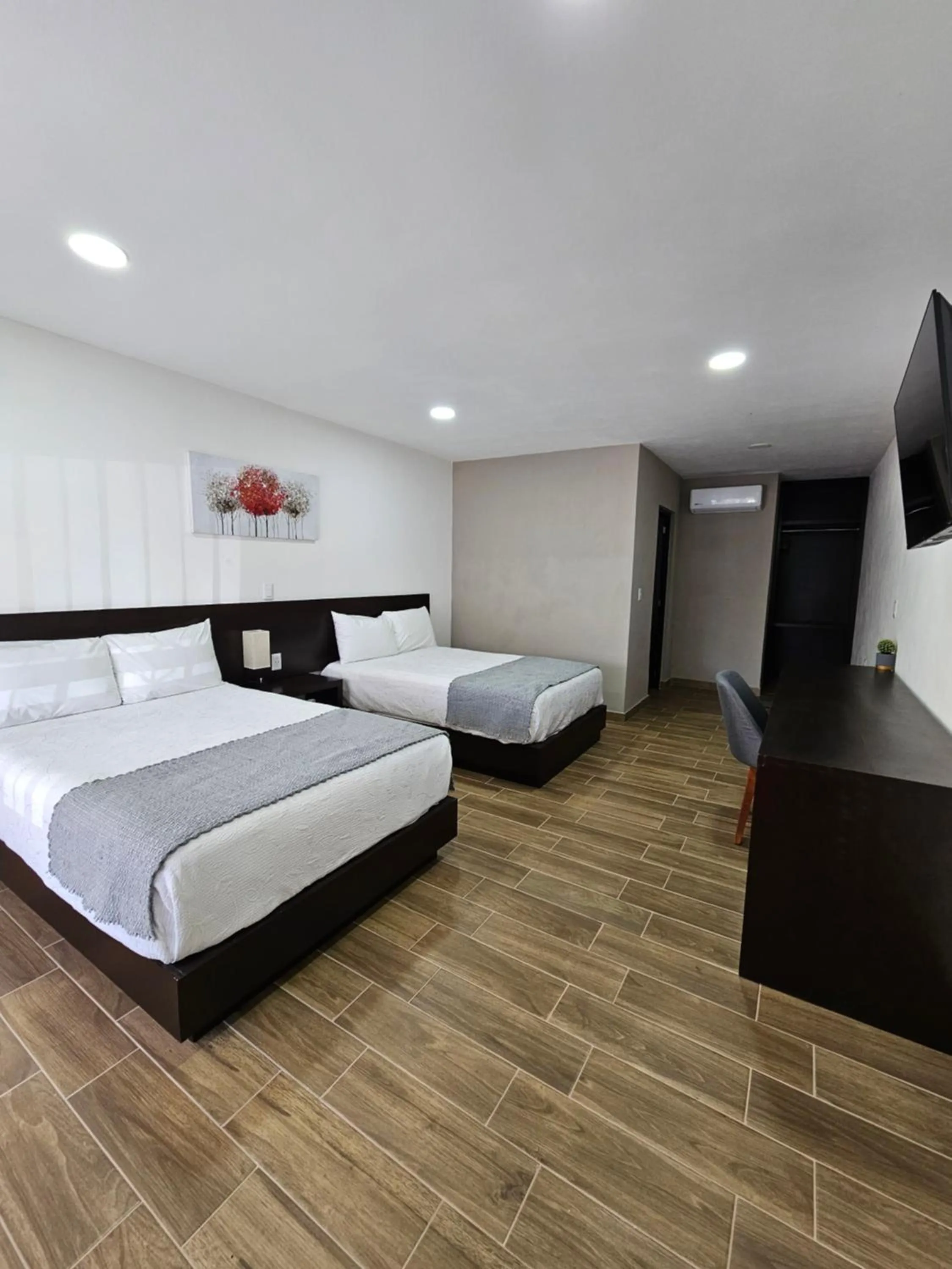 Bed in Hotel Ejecutivo Aeropuerto