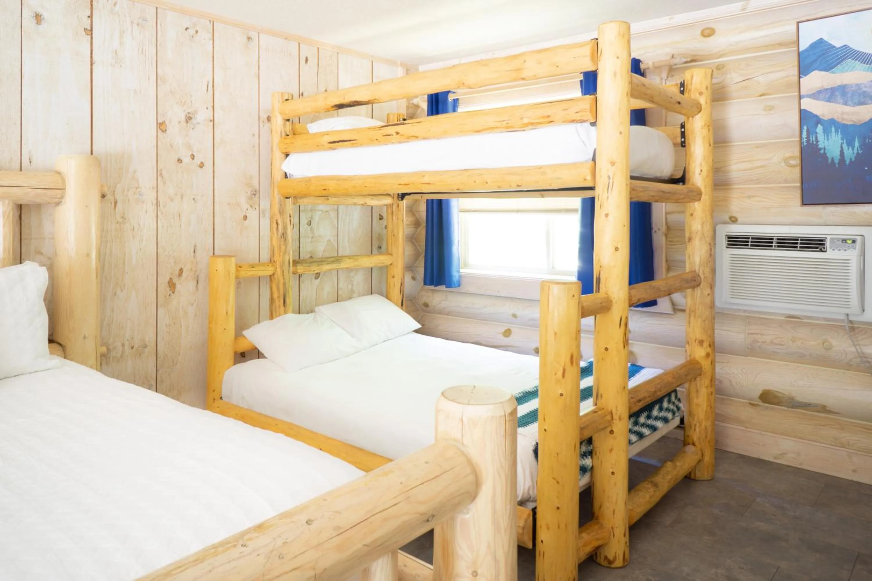 Bed in Log Inn Bonners Ferry