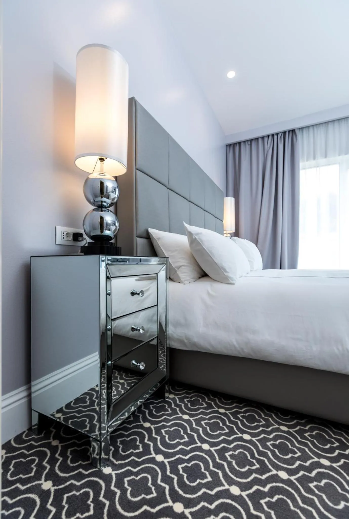 Bed in Royal Ariston Hotel