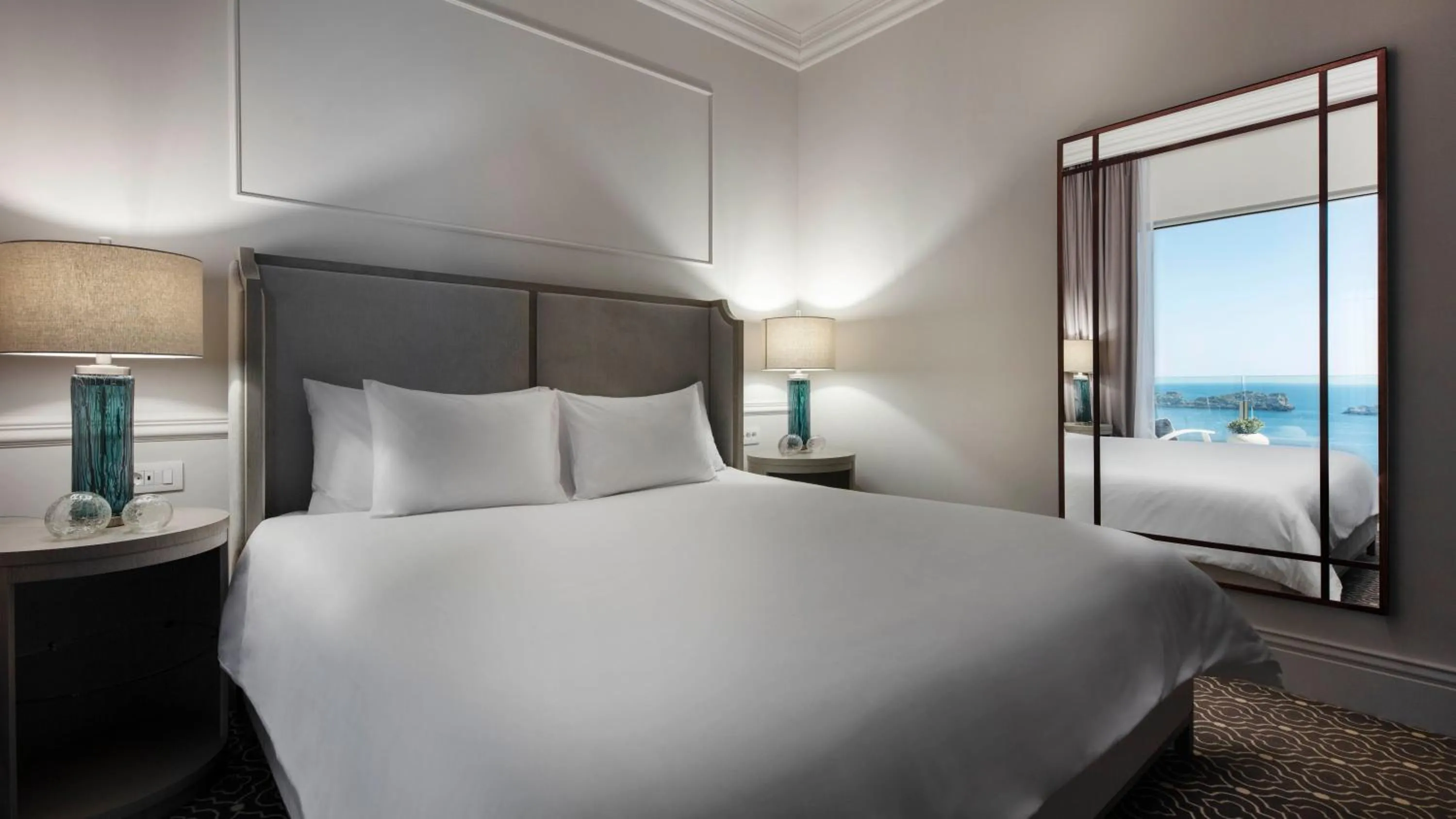 Bed in Royal Ariston Hotel