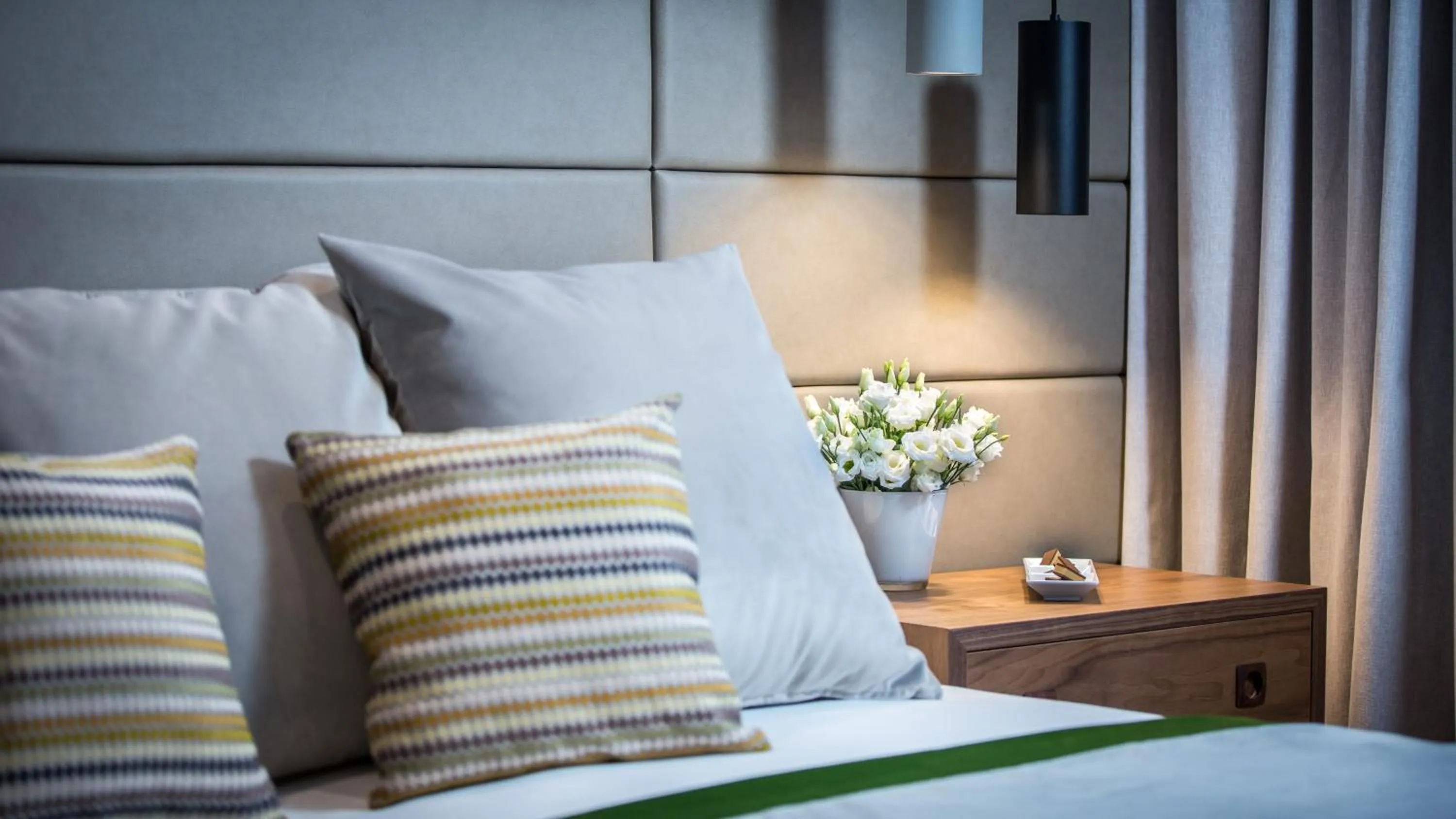 Bed in Royal Ariston Hotel