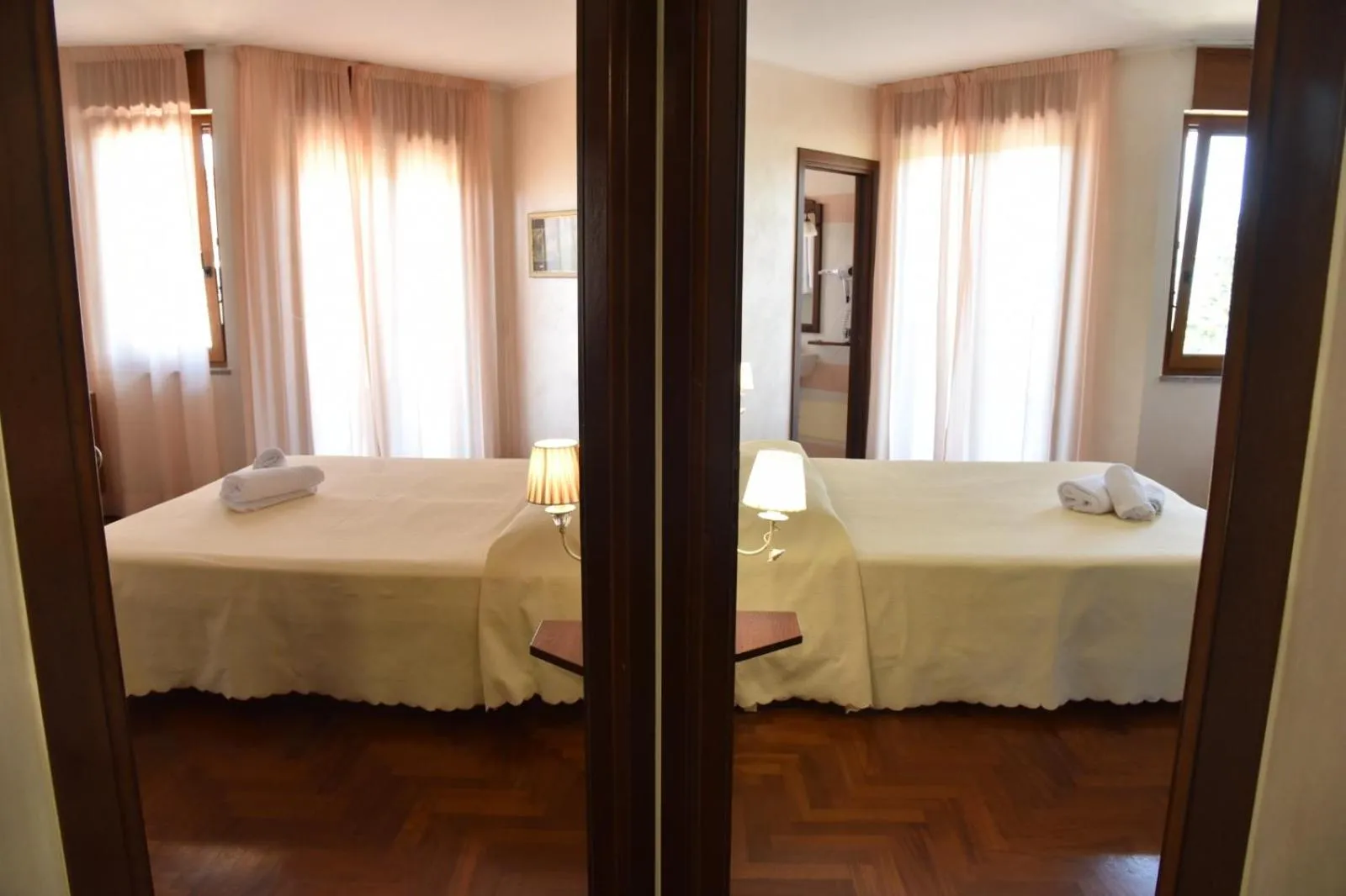 Bed in Hotel Sirio