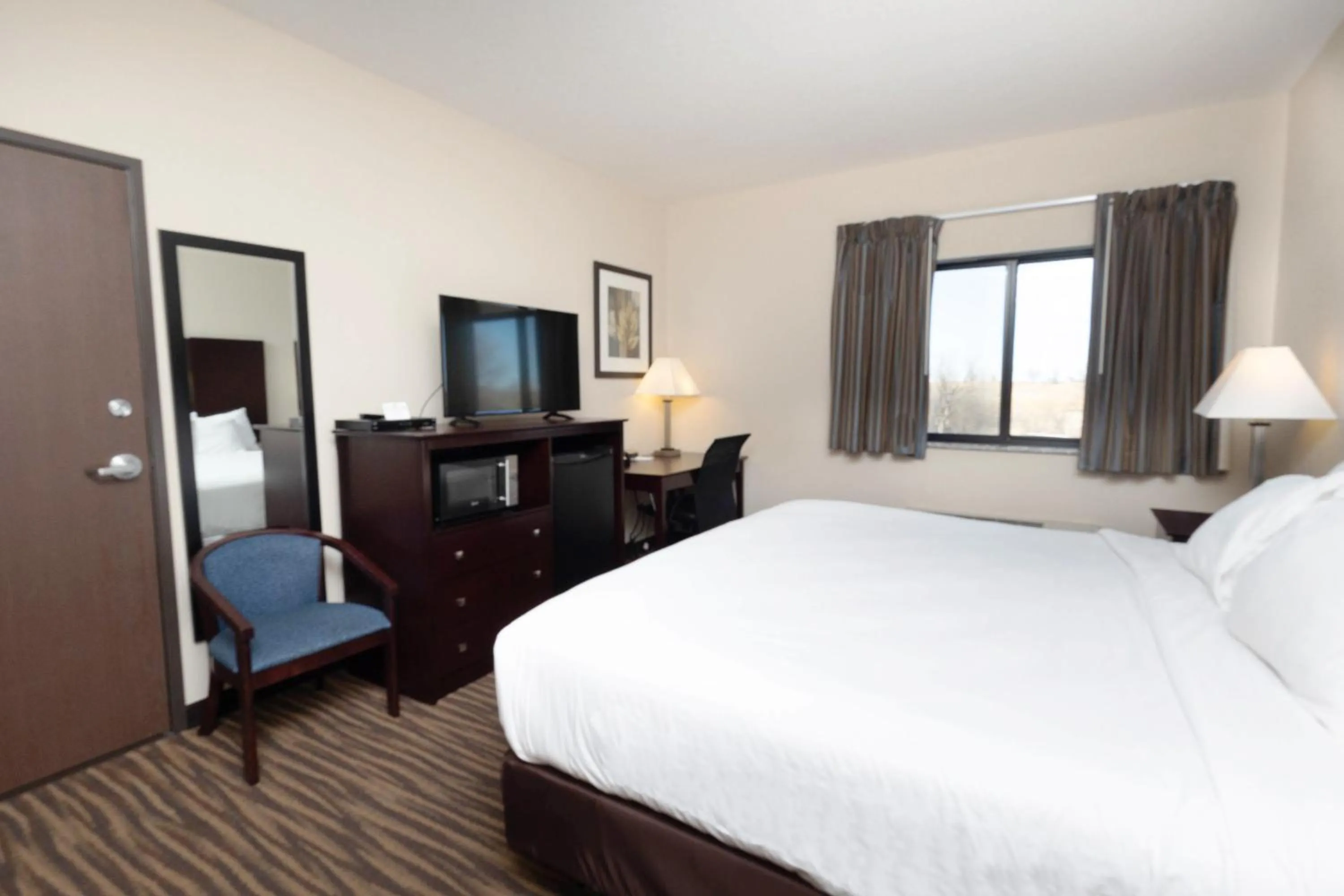 Bed in Cobblestone Inn & Suites Maryville