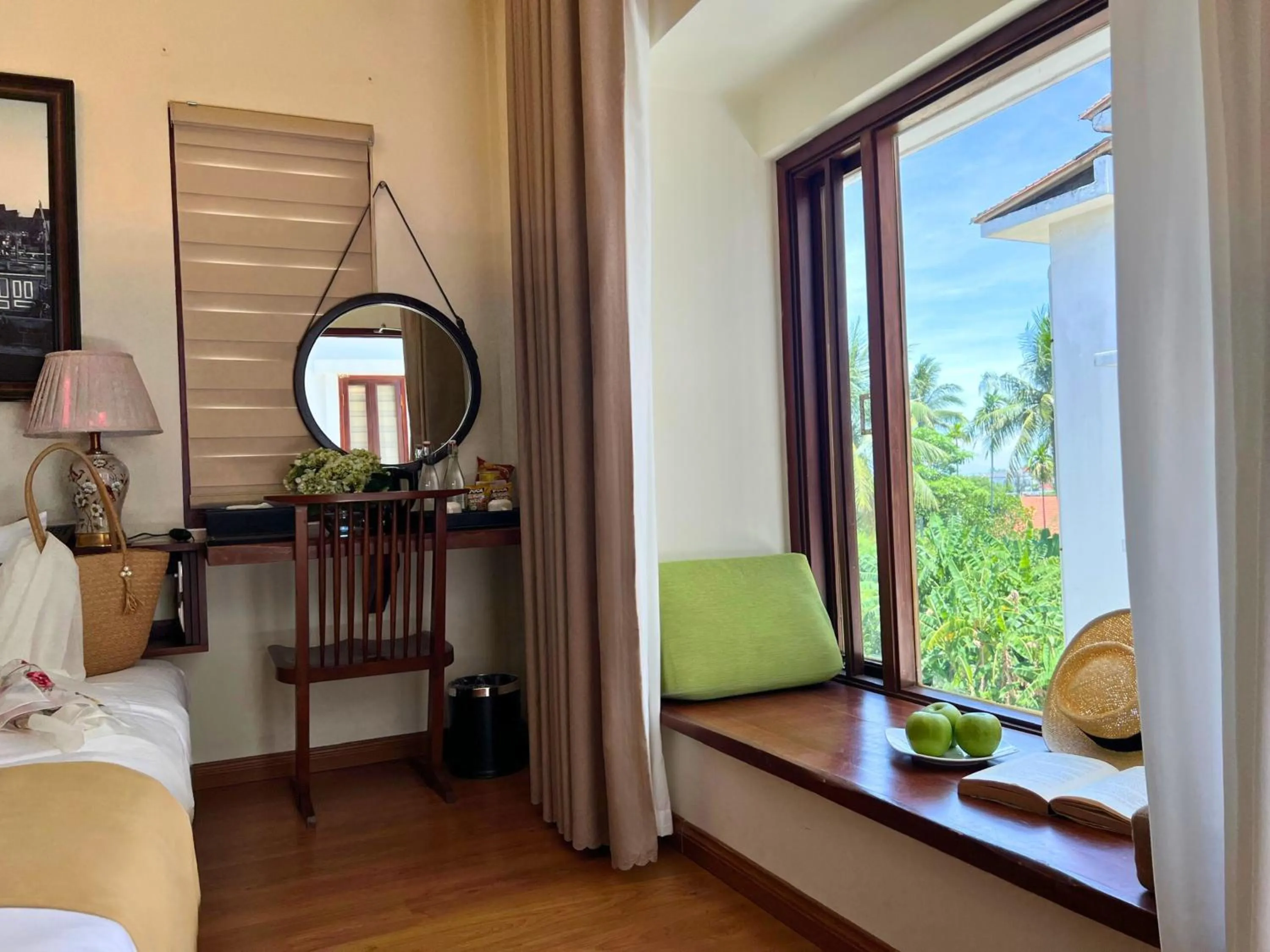 Seating area, Bed in Happy Life Memories Hoi An Hotel & Spa