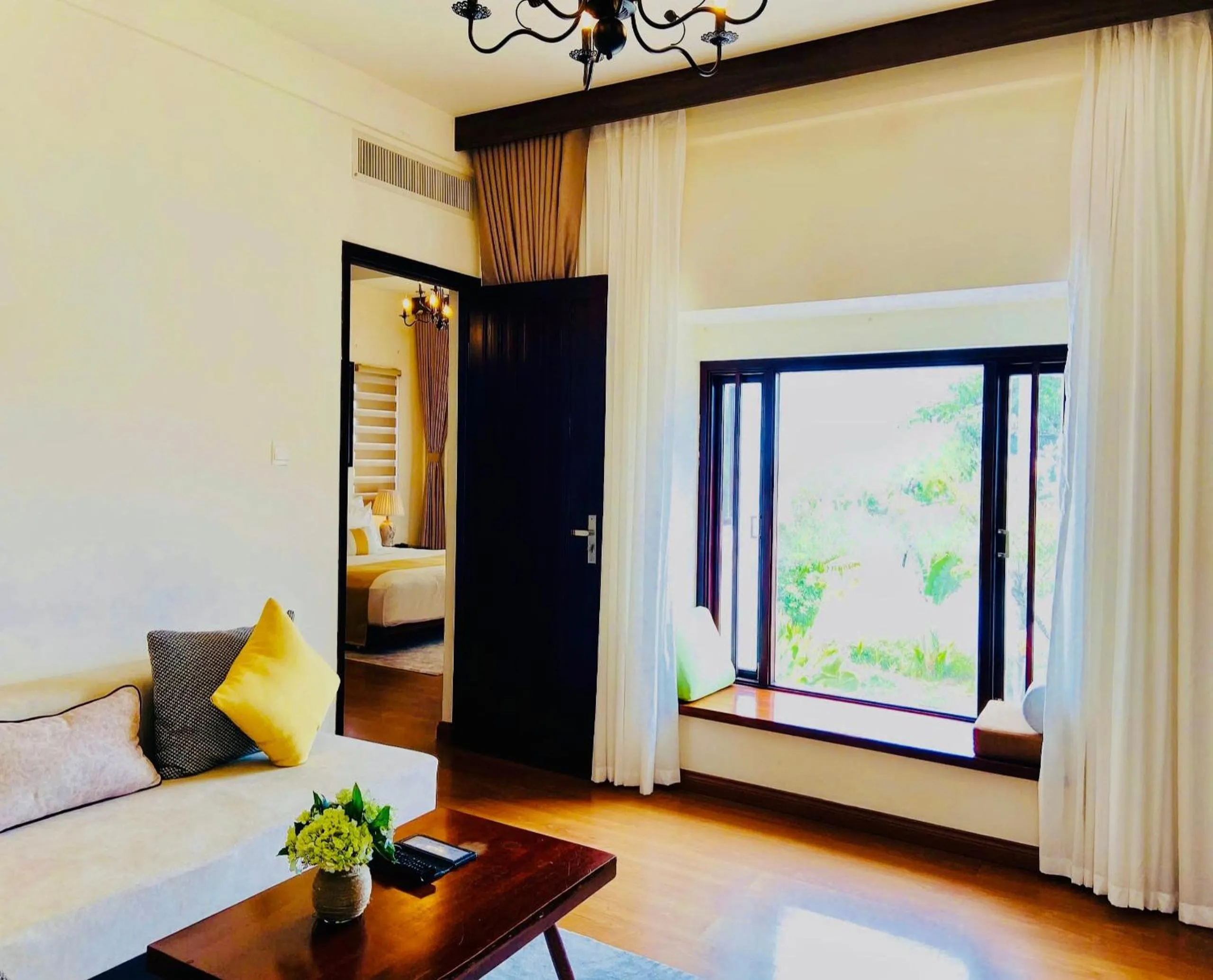 Living room, Bed in Happy Life Memories Hoi An Hotel & Spa