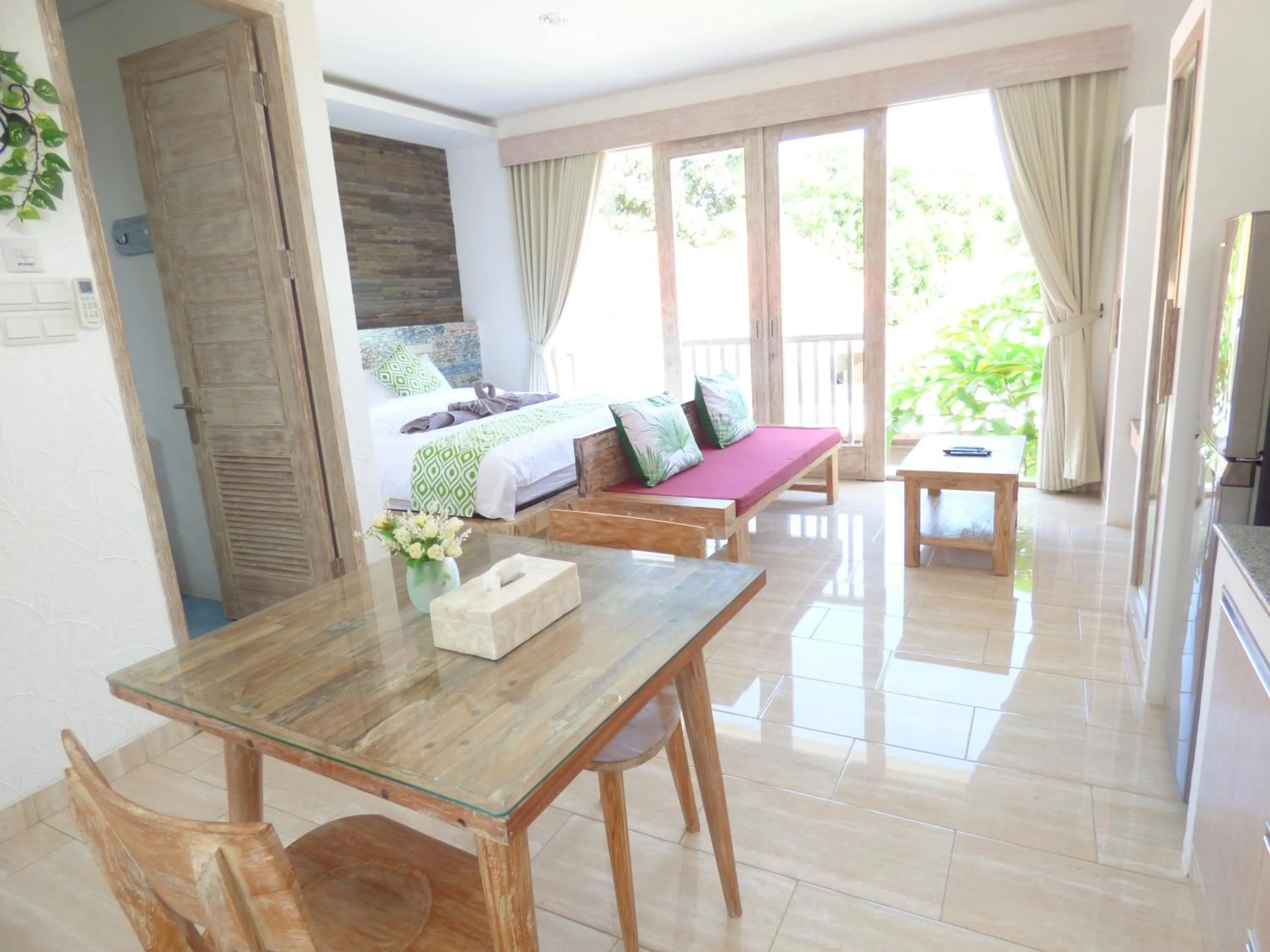 TV and multimedia in Green Studio Apartment Sanur
