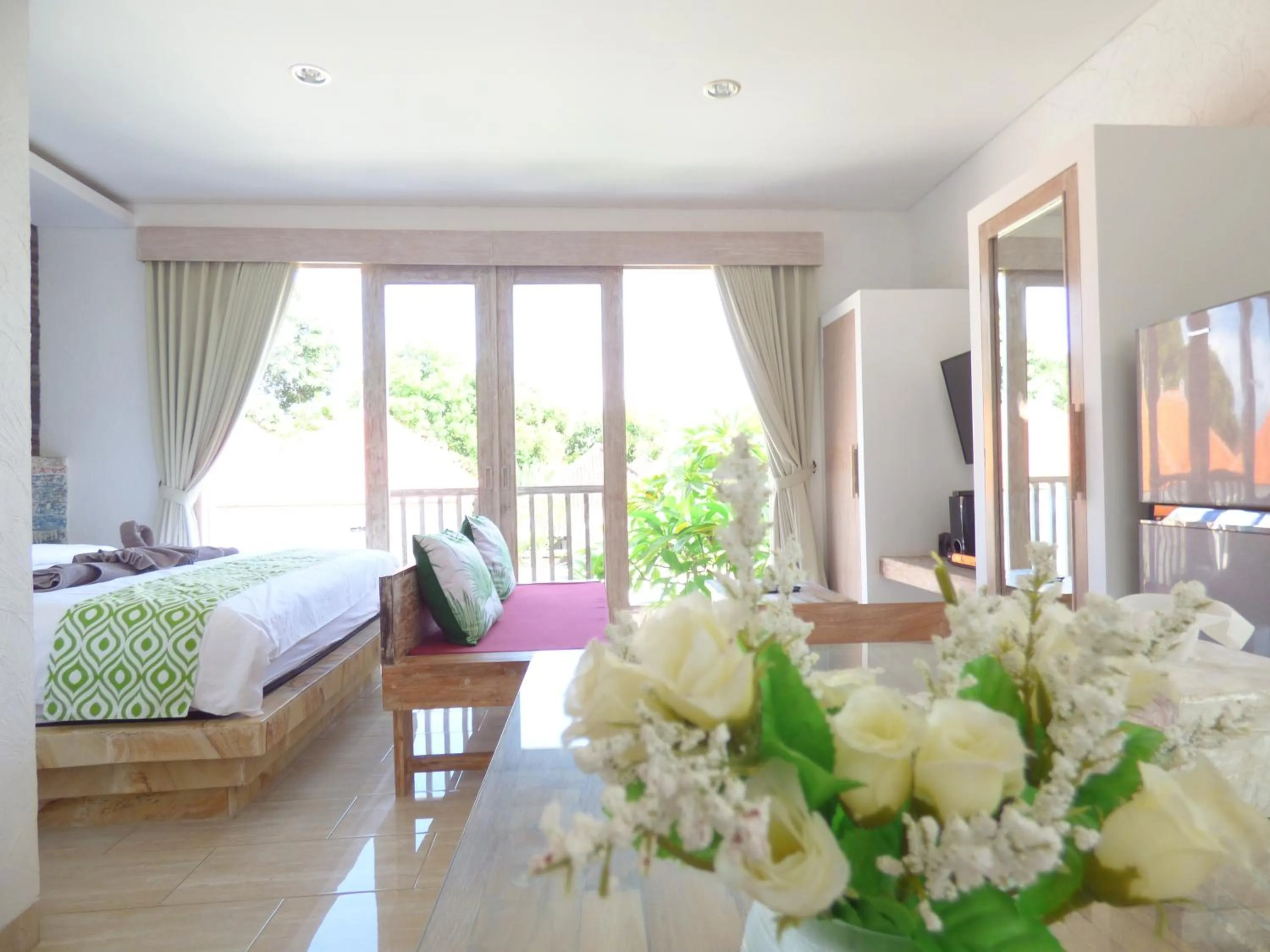 Living room, Bed in Green Studio Apartment Sanur